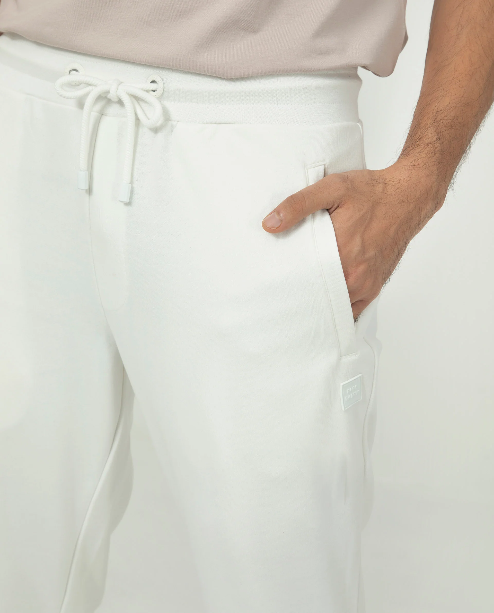 Rare Rabbit Men's Akagi Off White Cotton Plain Regular Fit Joggers - Image 3