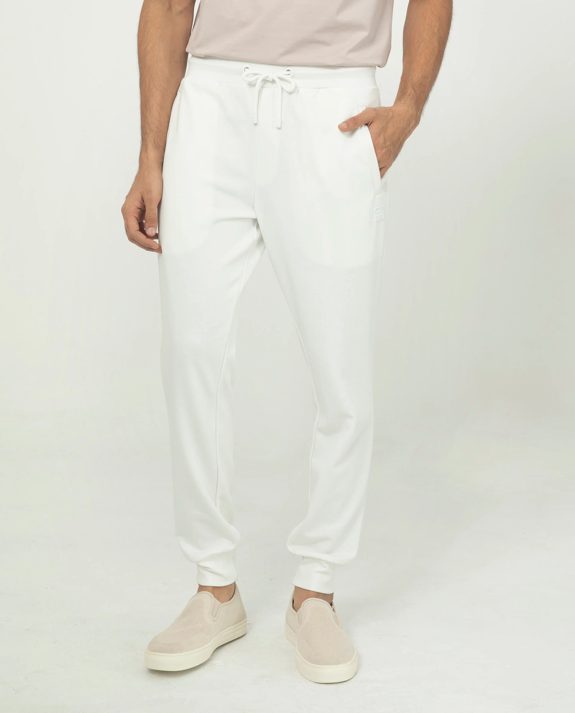 Rare Rabbit Men's Akagi Off White Cotton Plain Regular Fit Joggers - Image 4