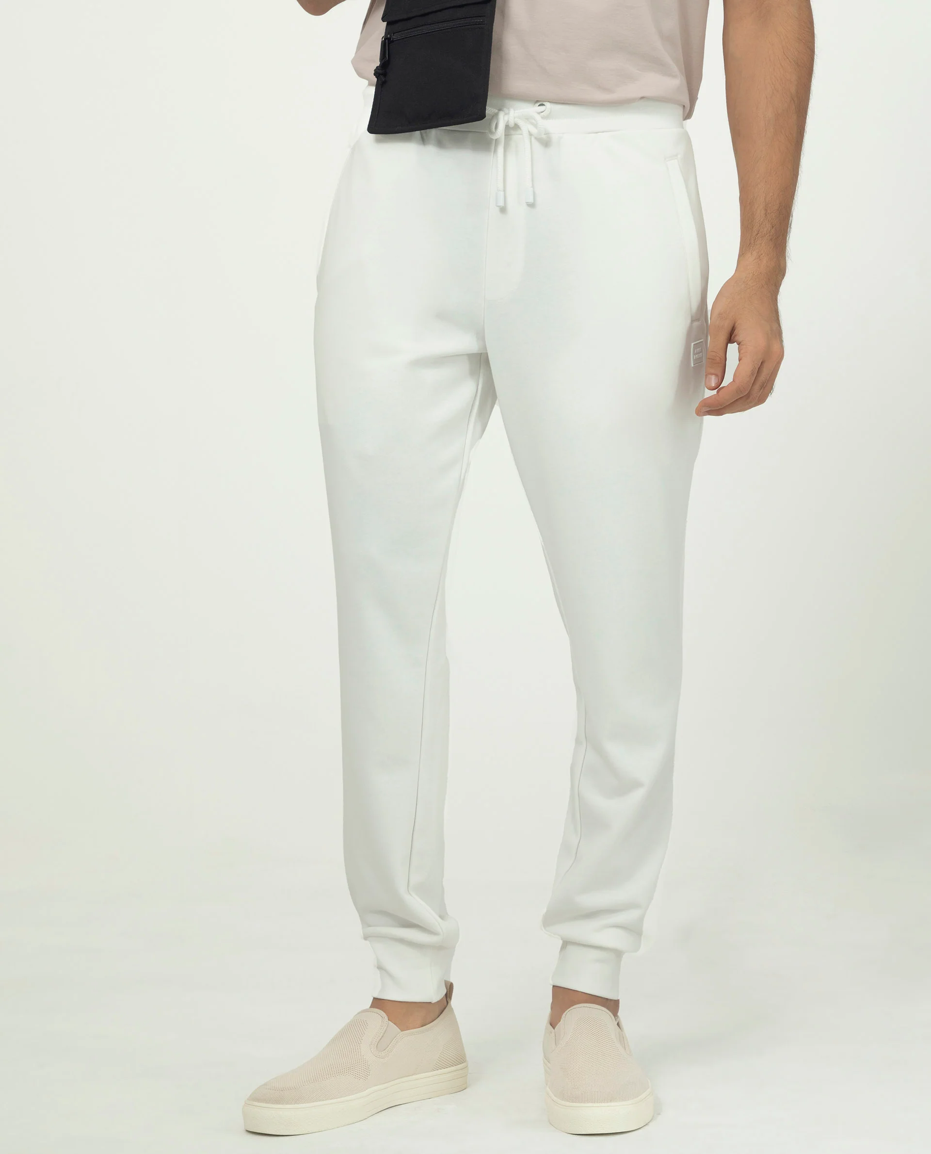 Rare Rabbit Men's Akagi Off White Cotton Plain Regular Fit Joggers - Image 9
