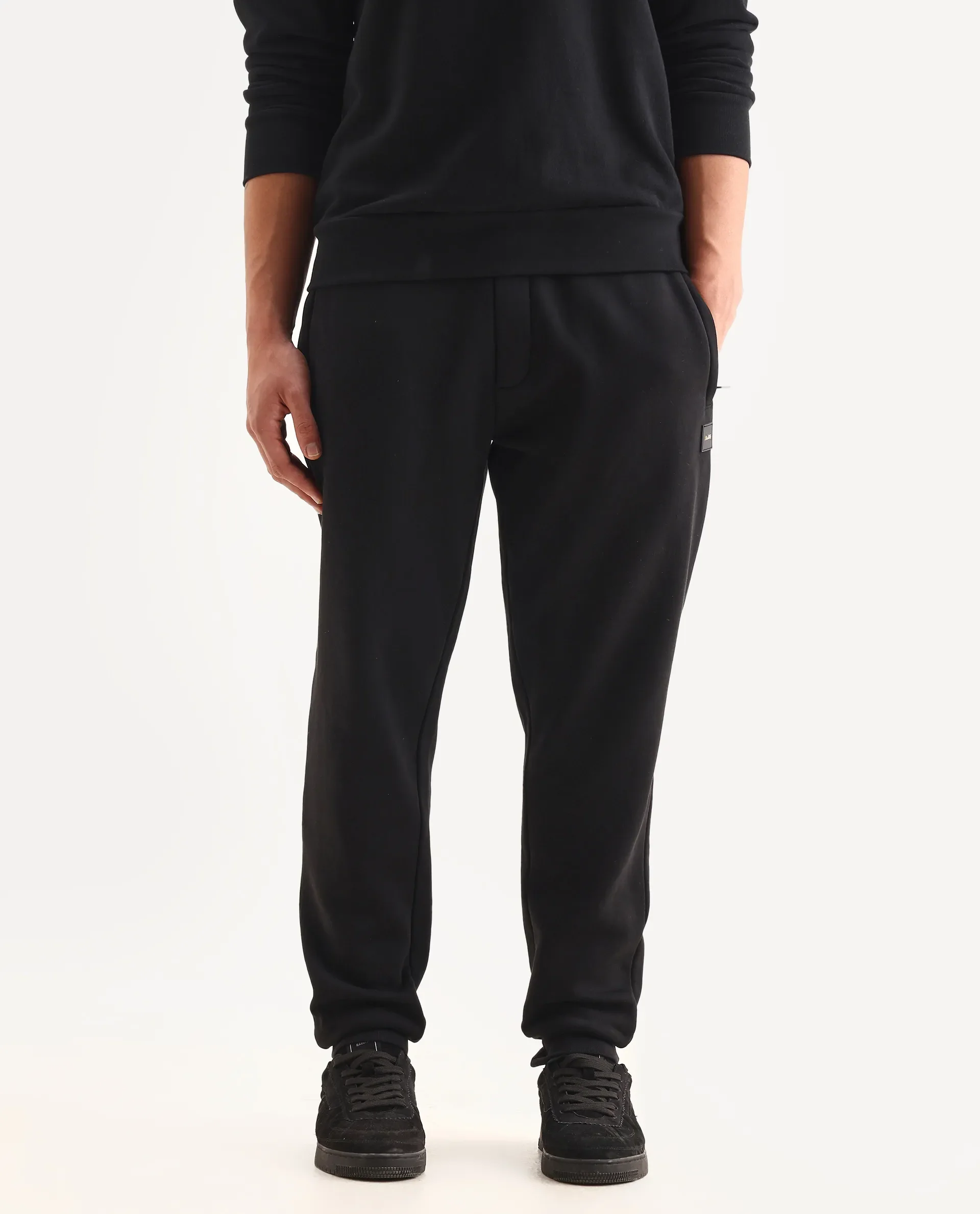 Rare Rabbit Men's Anderson-B25 Black Cotton Blend Fabric Badge Print Joggers - Image 2