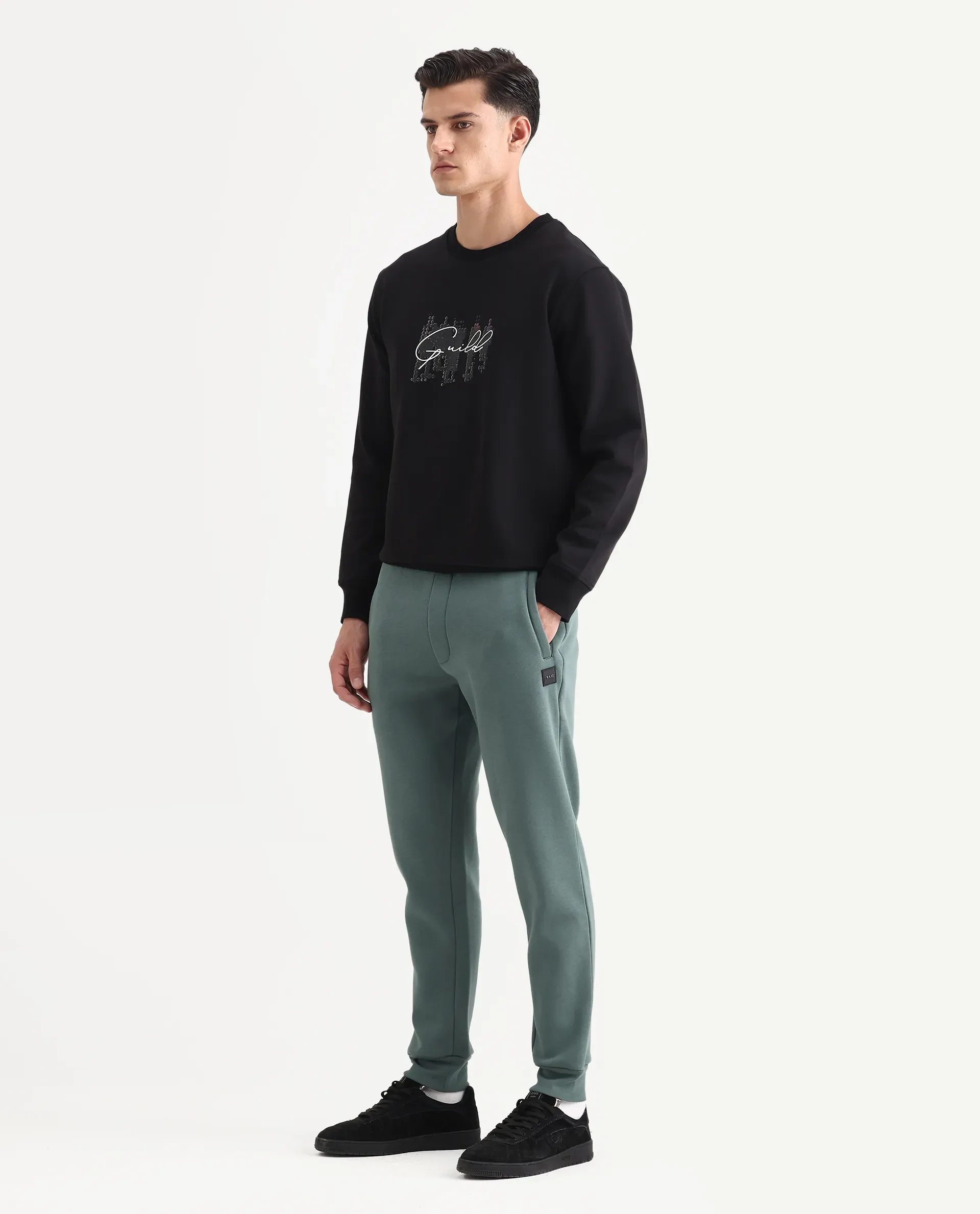 Rare Rabbit Men's Anderson-B25 Dusky Green Cotton Blend Fabric Regular Fit Badge Print Joggers - Image 4