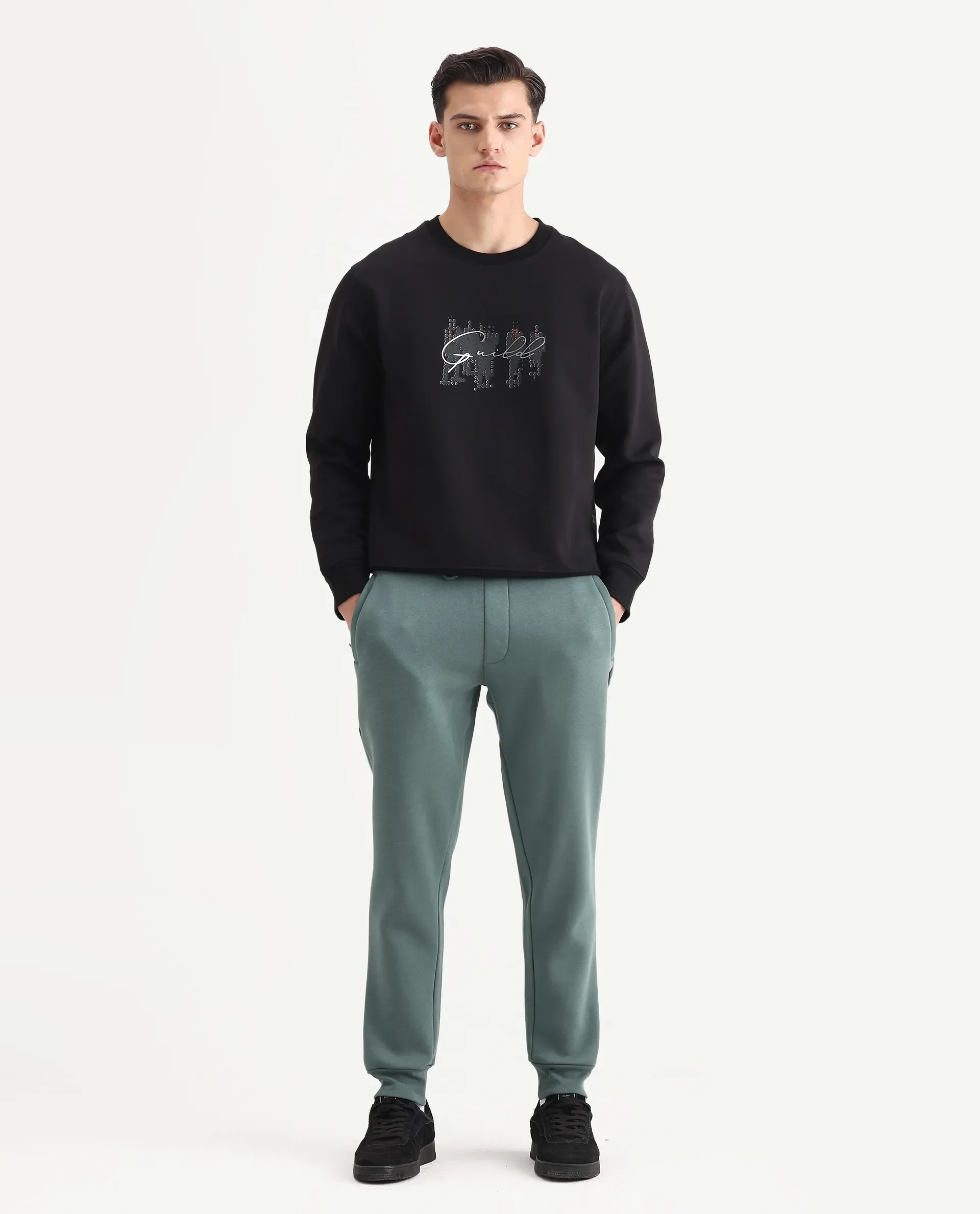Rare Rabbit Men's Anderson-B25 Dusky Green Cotton Blend Fabric Regular Fit Badge Print Joggers - Image 7