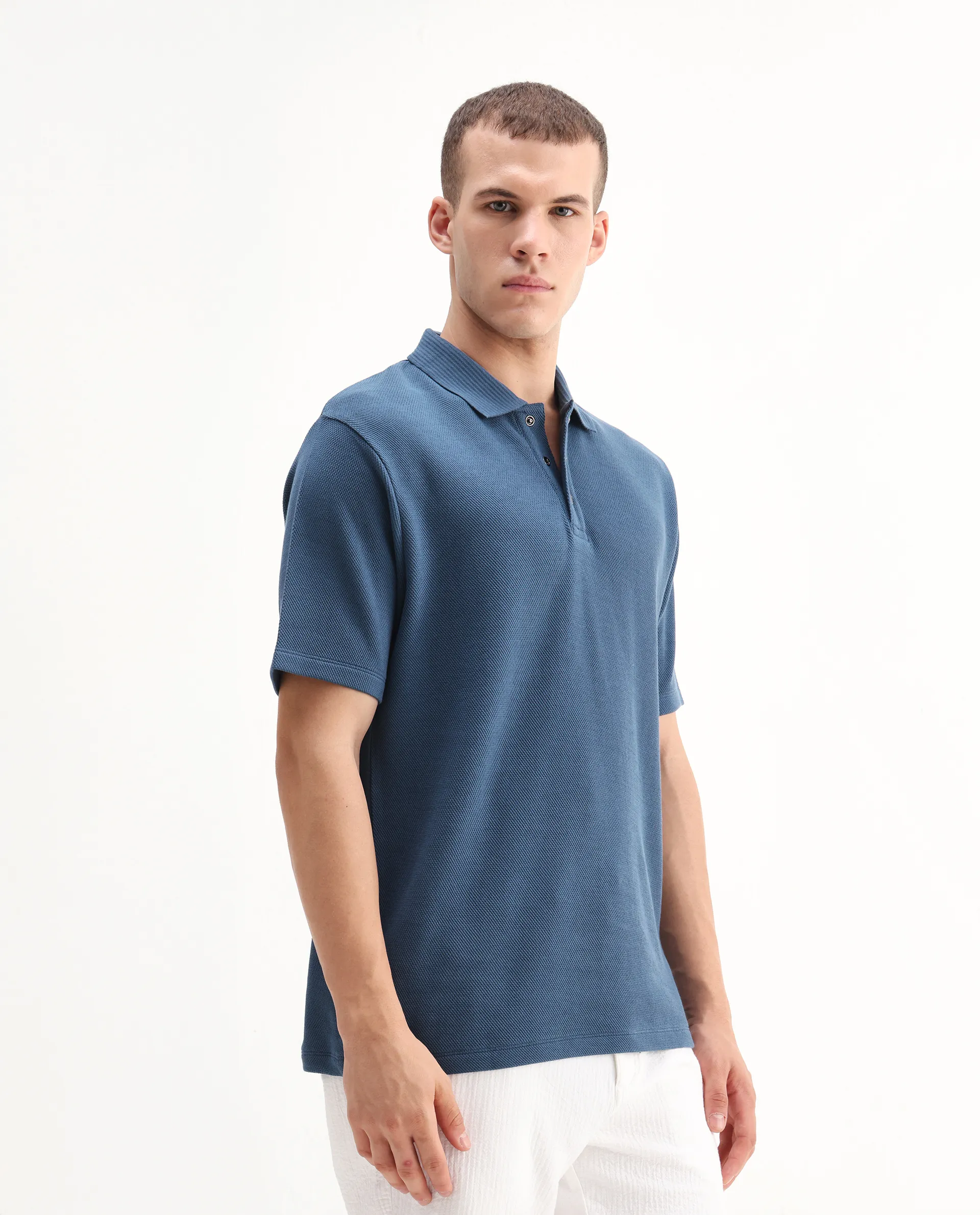 Rare Rabbit Men's Ania Teal Cotton Plain Regular Fit Half Sleeve Polo - Image 5