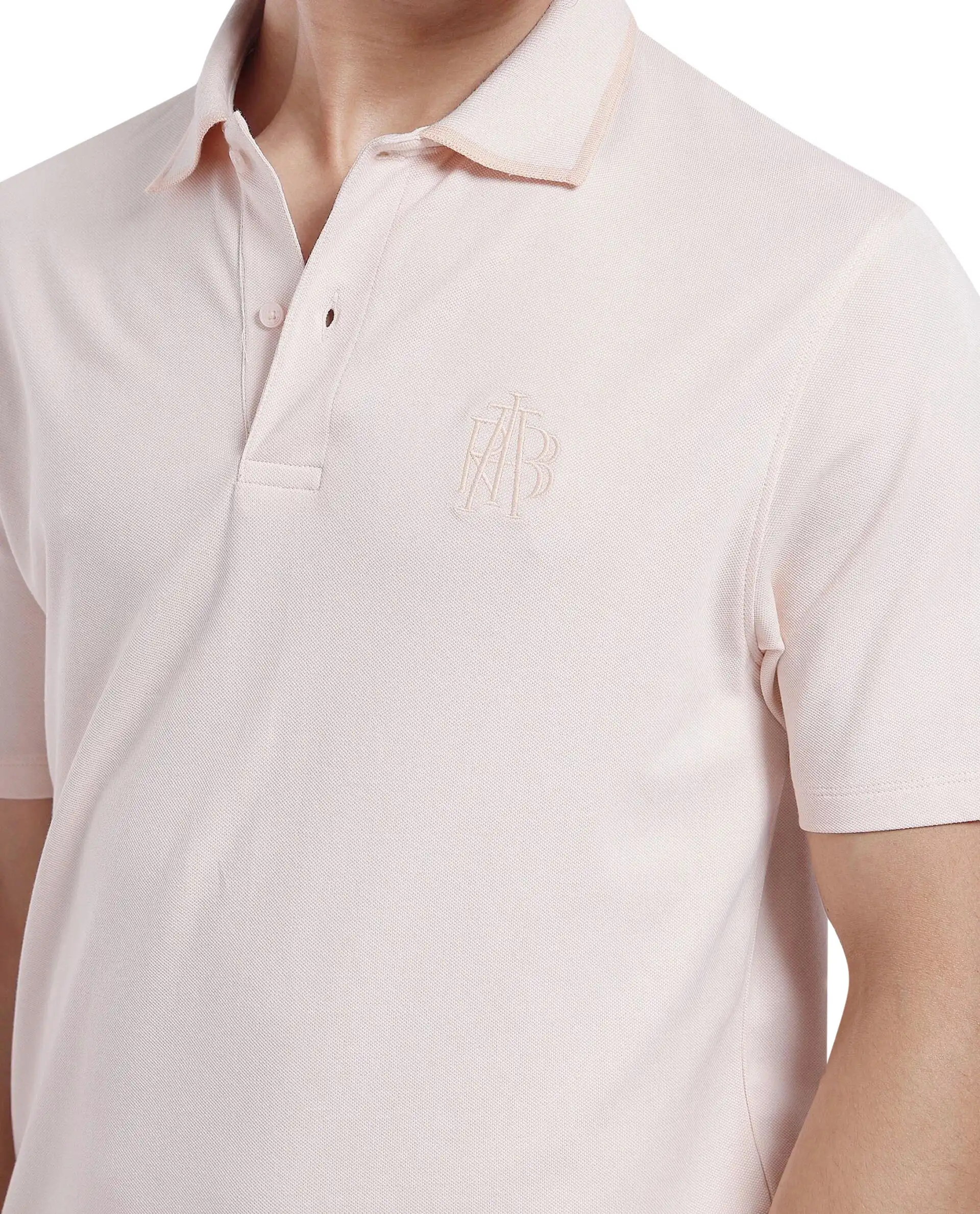Rare Rabbit Men's Aroe Pastel Peach Lycra Plain Regular Fit Half Sleeve Polo - Image 7
