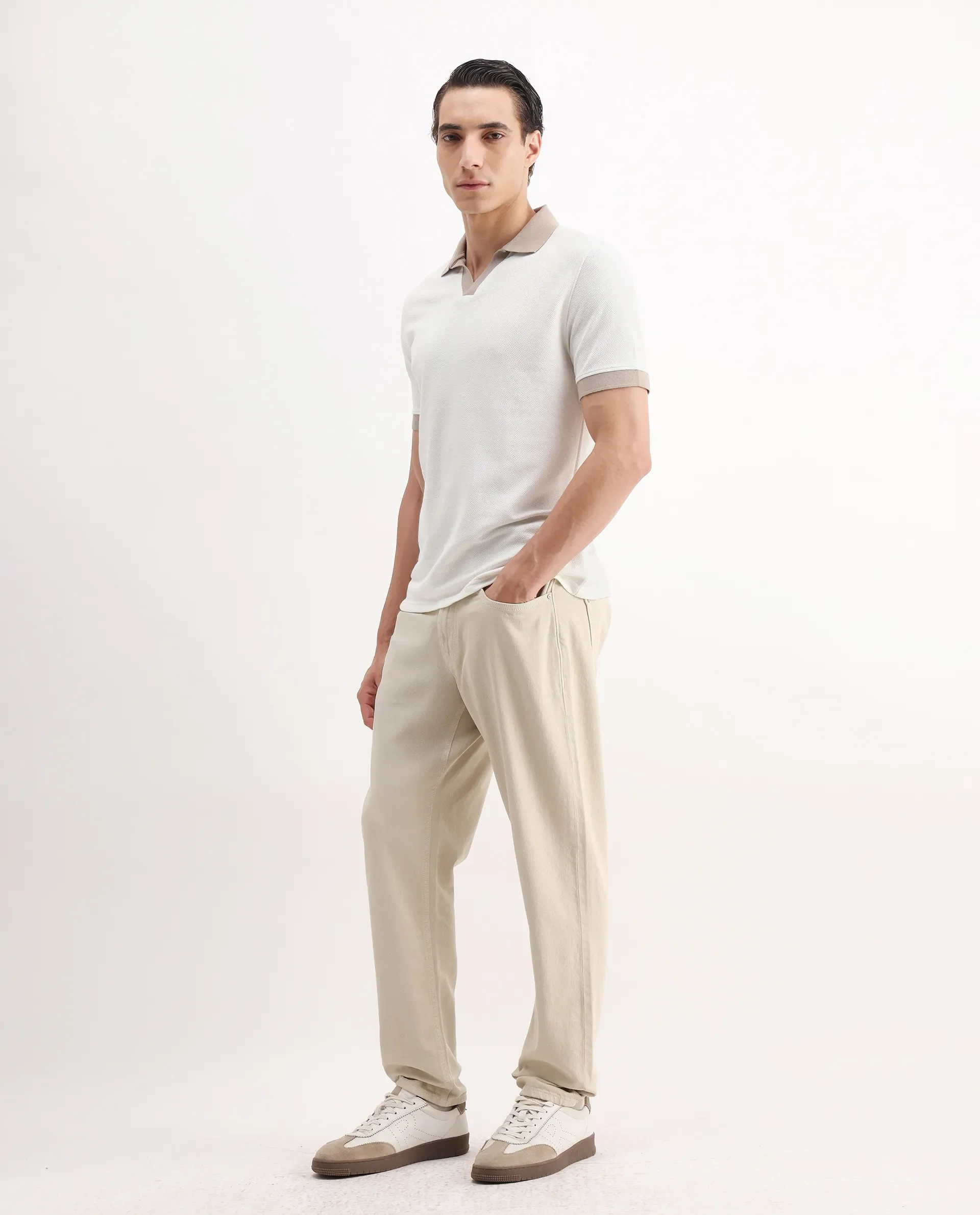 Rare Rabbit Men's Arvi-2 Light Beige Cotton Blend Plain Dond Carrot Fit Jeans - Image 4