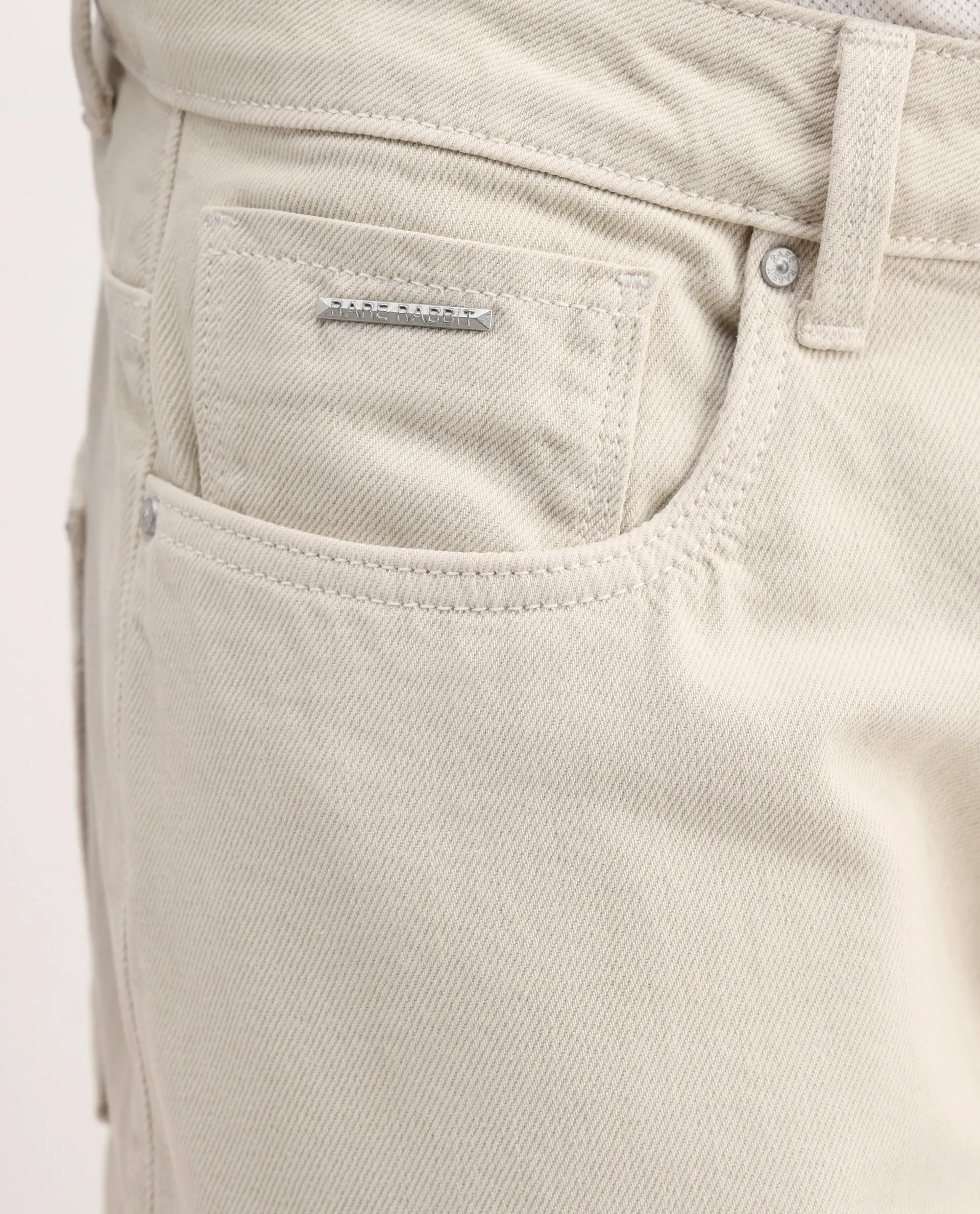 Rare Rabbit Men's Arvi-2 Light Beige Cotton Blend Plain Dond Carrot Fit Jeans - Image 7