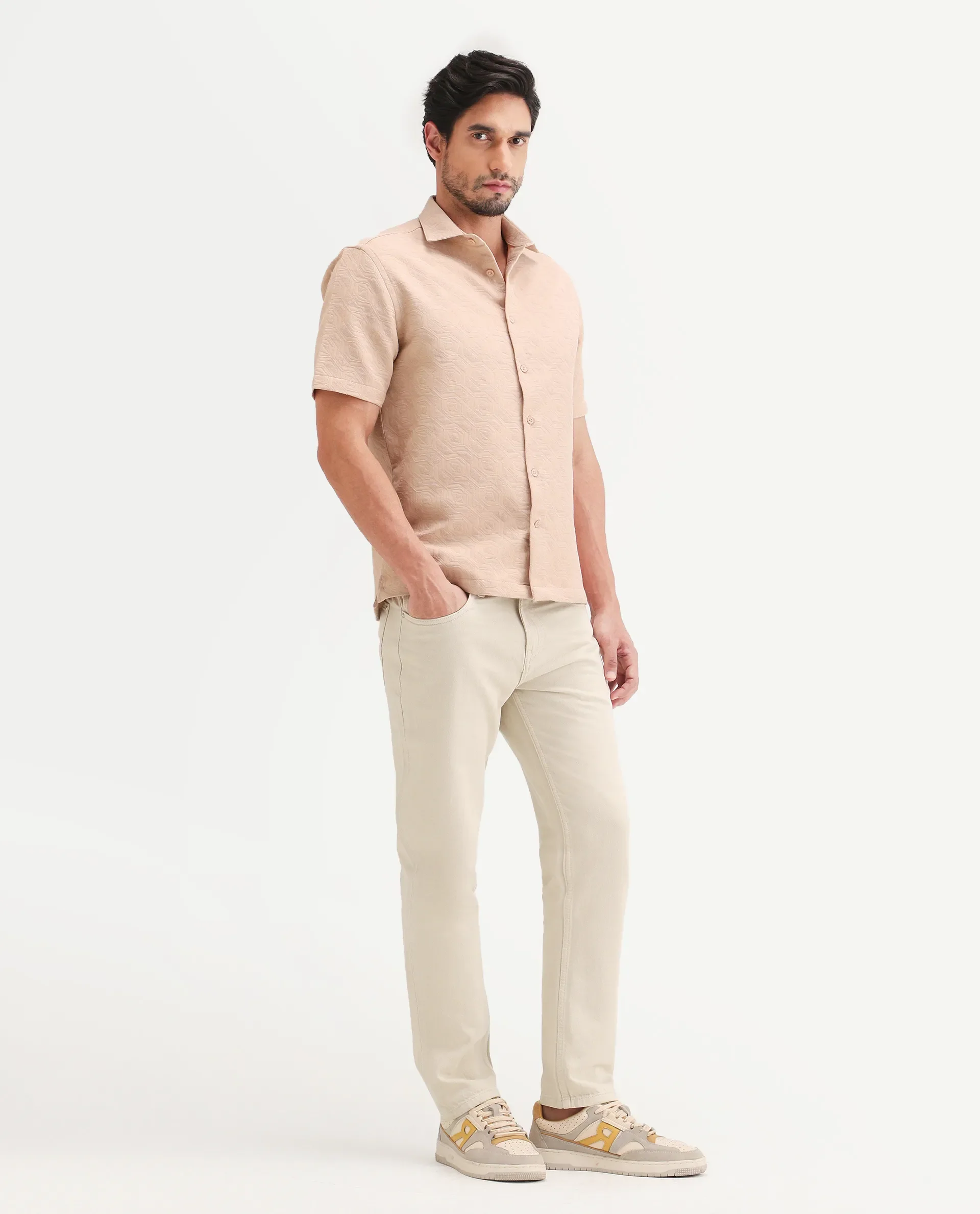 Rare Rabbit Men's Arvi B Beige Cotton Fabric Shank And Zipper Kurt Carrot Plain Jeans - Image 7