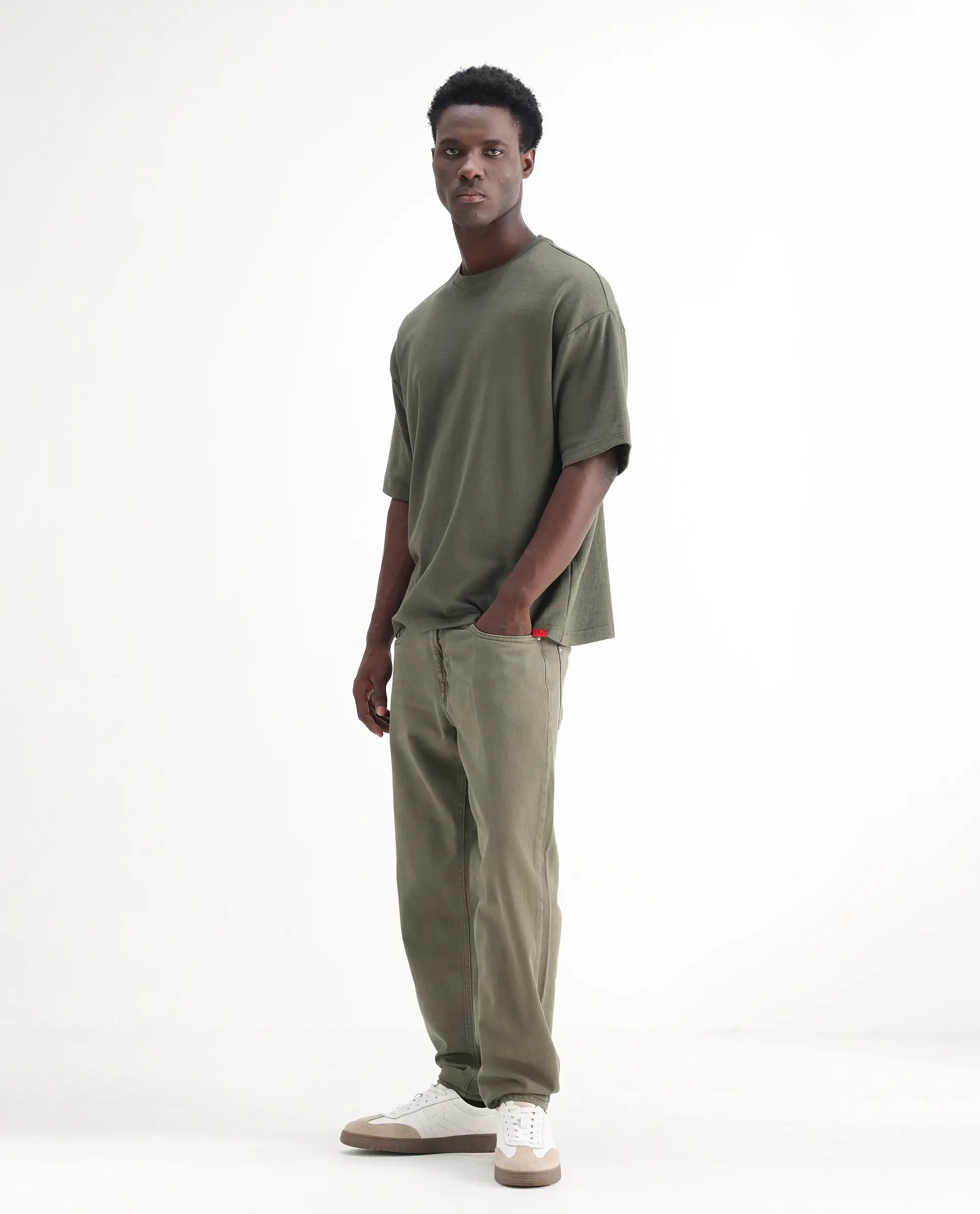 Rare Rabbit Men's Arvi Green Cotton Plain Dond Carrot Fit Jeans - Image 7