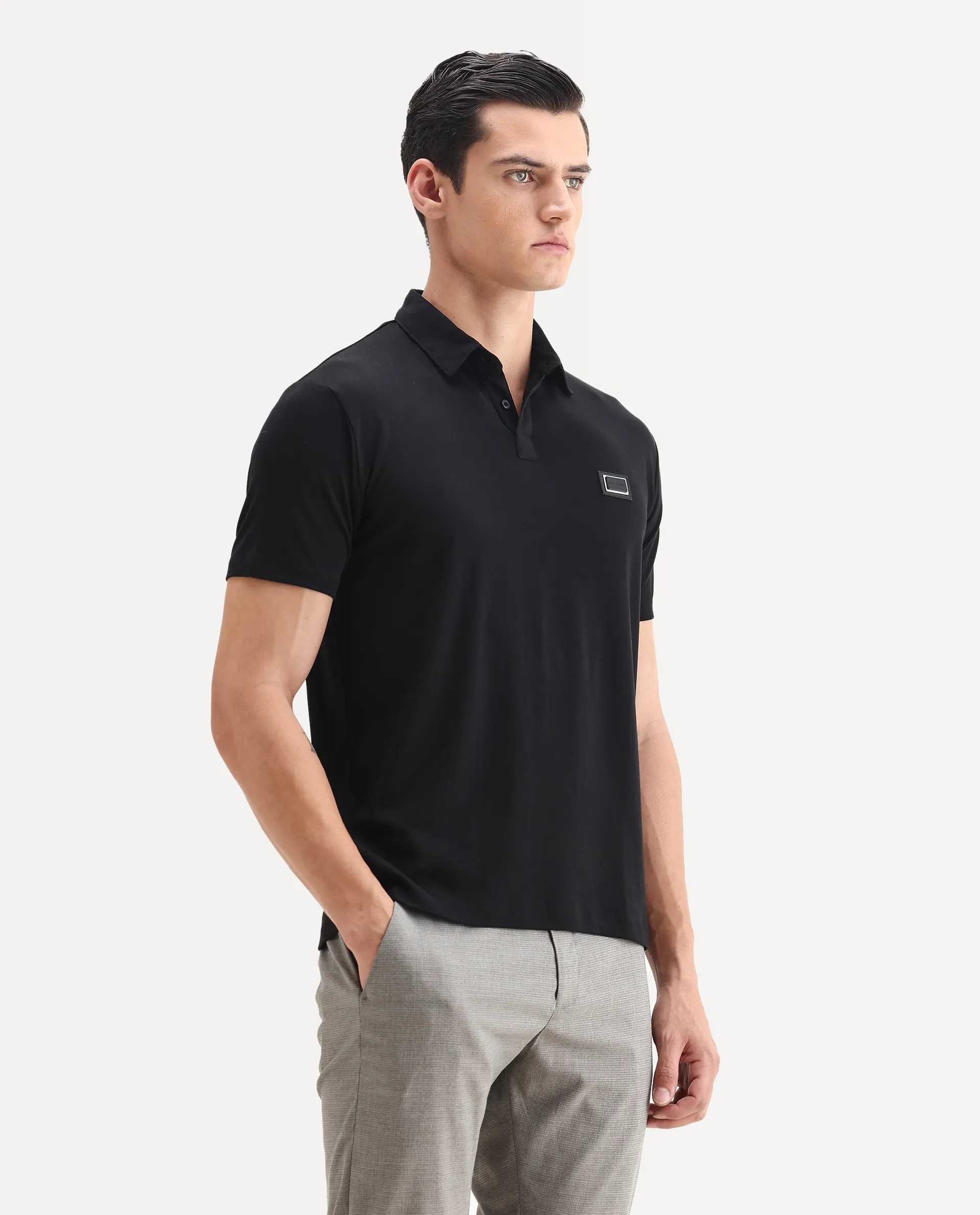 Rare Rabbit Men's Badger-1 Black Cotton Plain Regular Fit Half Sleeve Polo - Image 5