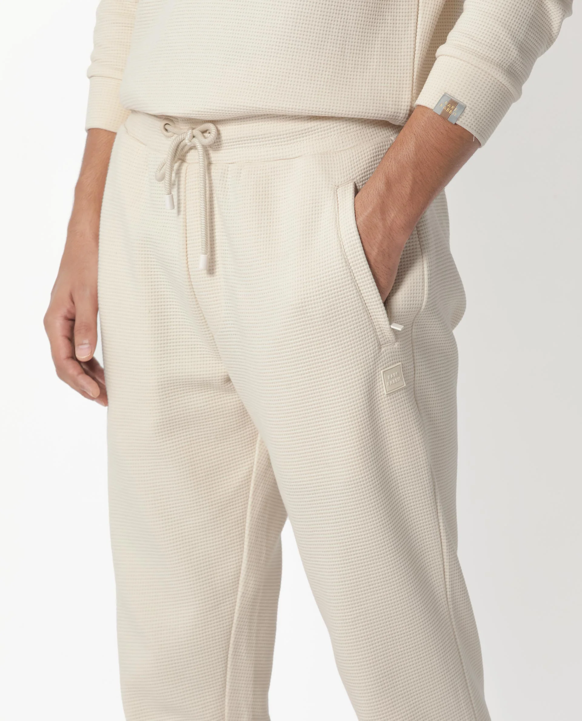 Rare Rabbit Men's Bastian Beige Waffle Print Regular Fit Track Pant - Image 3