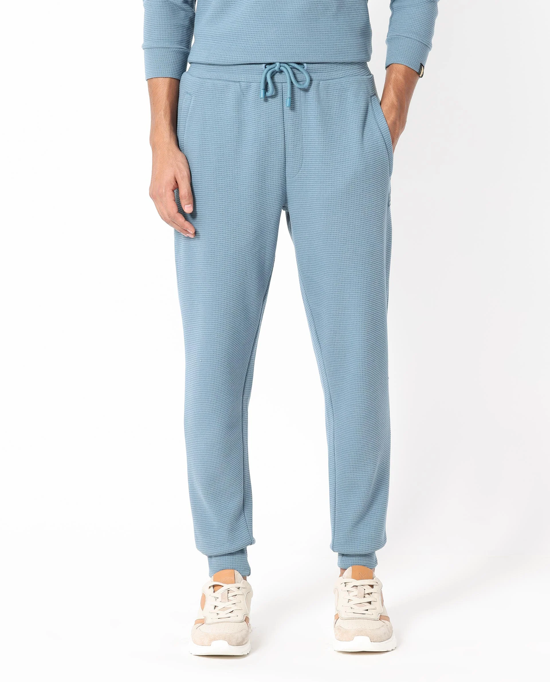 Rare Rabbit Men's Bastian Teal Waffle Print Regular Fit Track Pant - Image 4