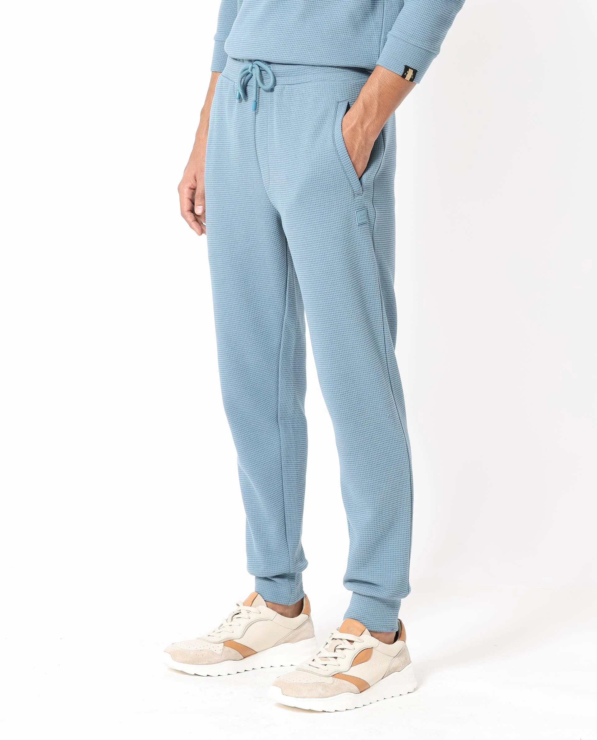 Rare Rabbit Men's Bastian Teal Waffle Print Regular Fit Track Pant - Image 6