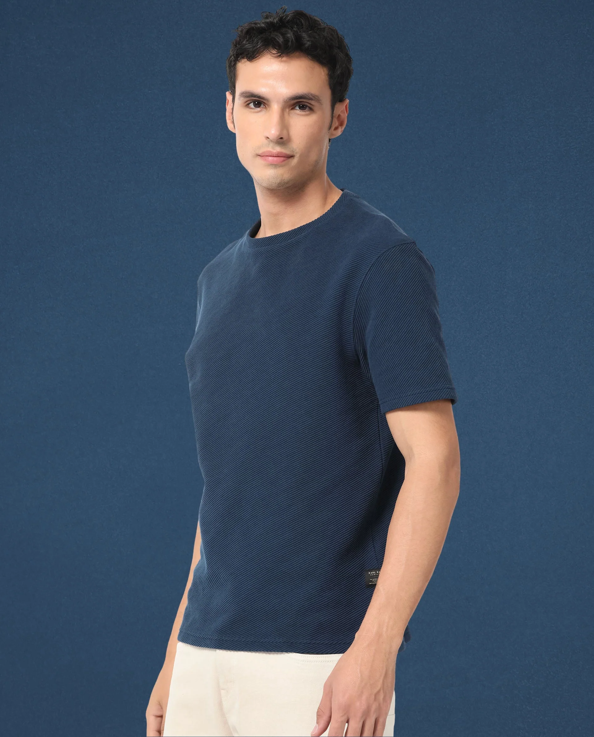 Rare Rabbit Men's Cas Petrol Solid Crew Neck Ottoman Textured Drop Shoulder Half Sleeves T-Shirt - Image 11