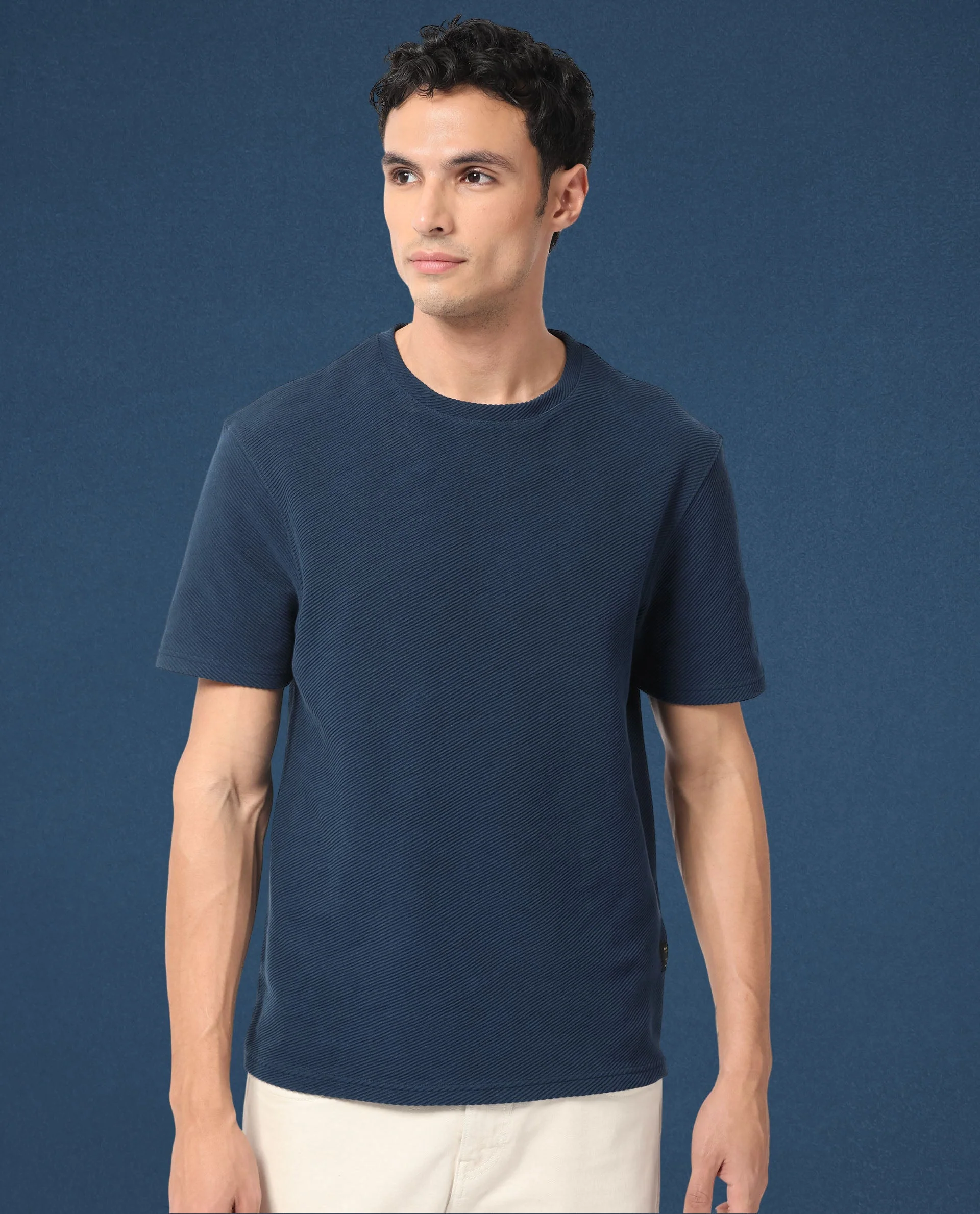 Rare Rabbit Men's Cas Petrol Solid Crew Neck Ottoman Textured Drop Shoulder Half Sleeves T-Shirt - Image 9