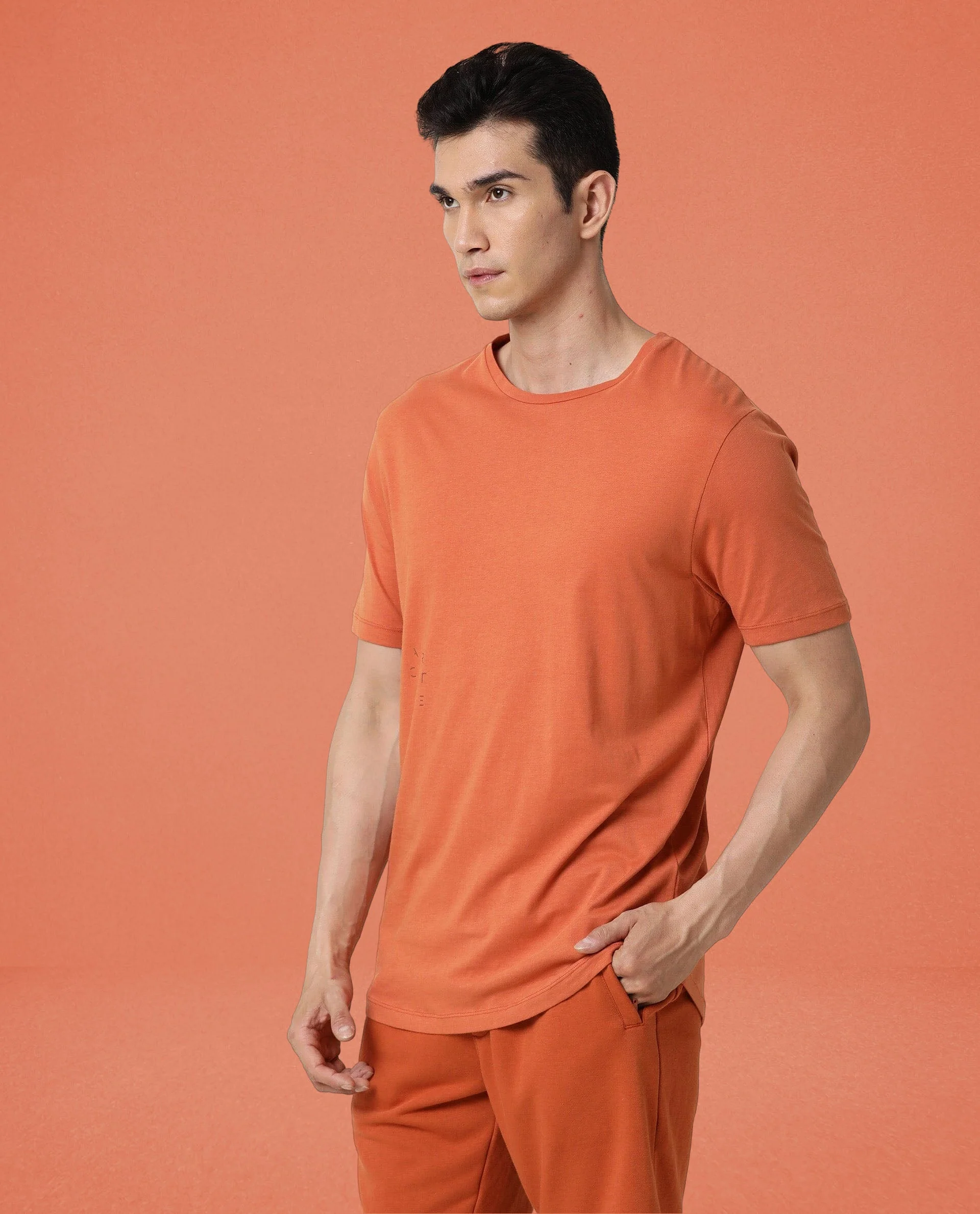 Rare Rabbit Articale Men's Caxel Tangy Orange Crew Neck Offset Brand Print Half Sleeves T-Shirt - Image 3