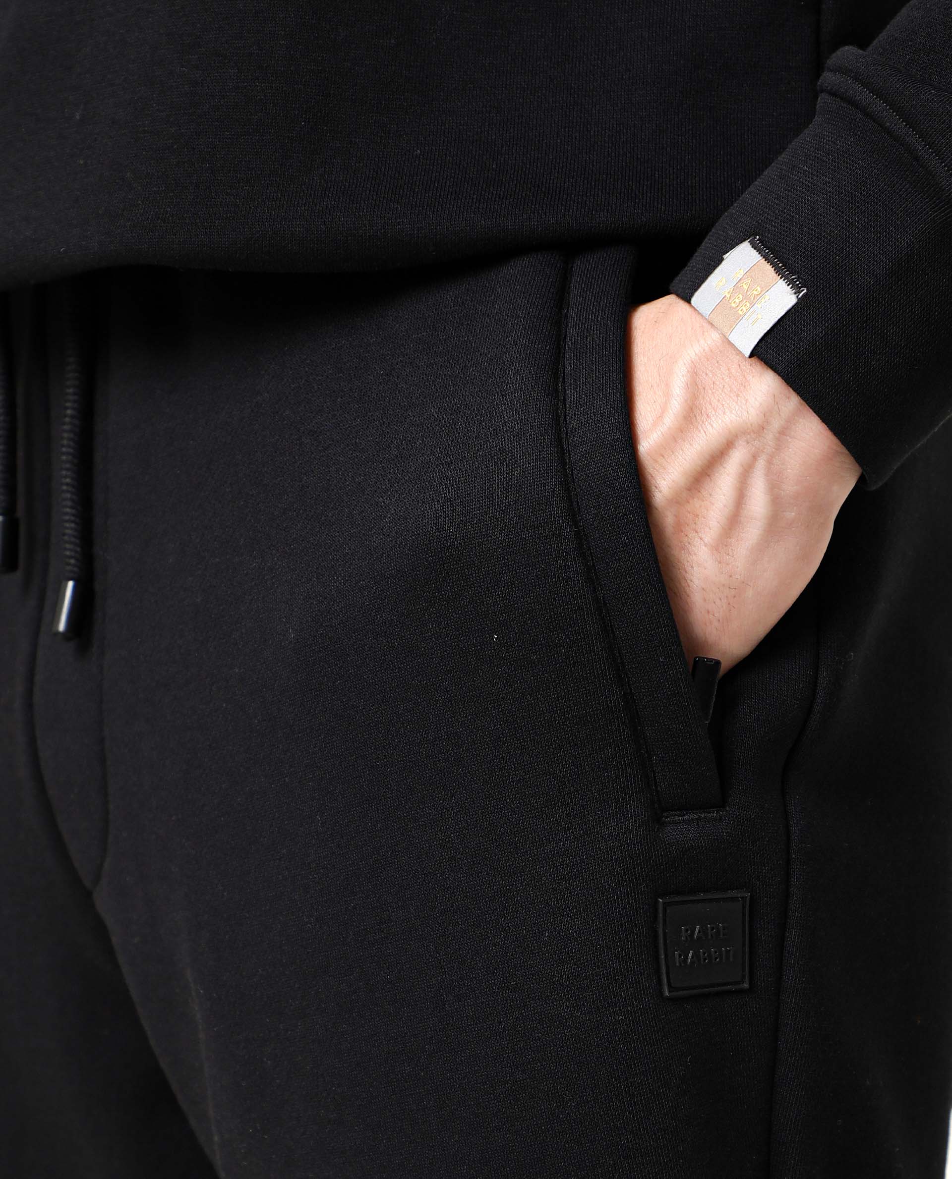 Rare Rabbit Men's Chase Black Cotton Plain Regular Fit Track Pant - Image 3