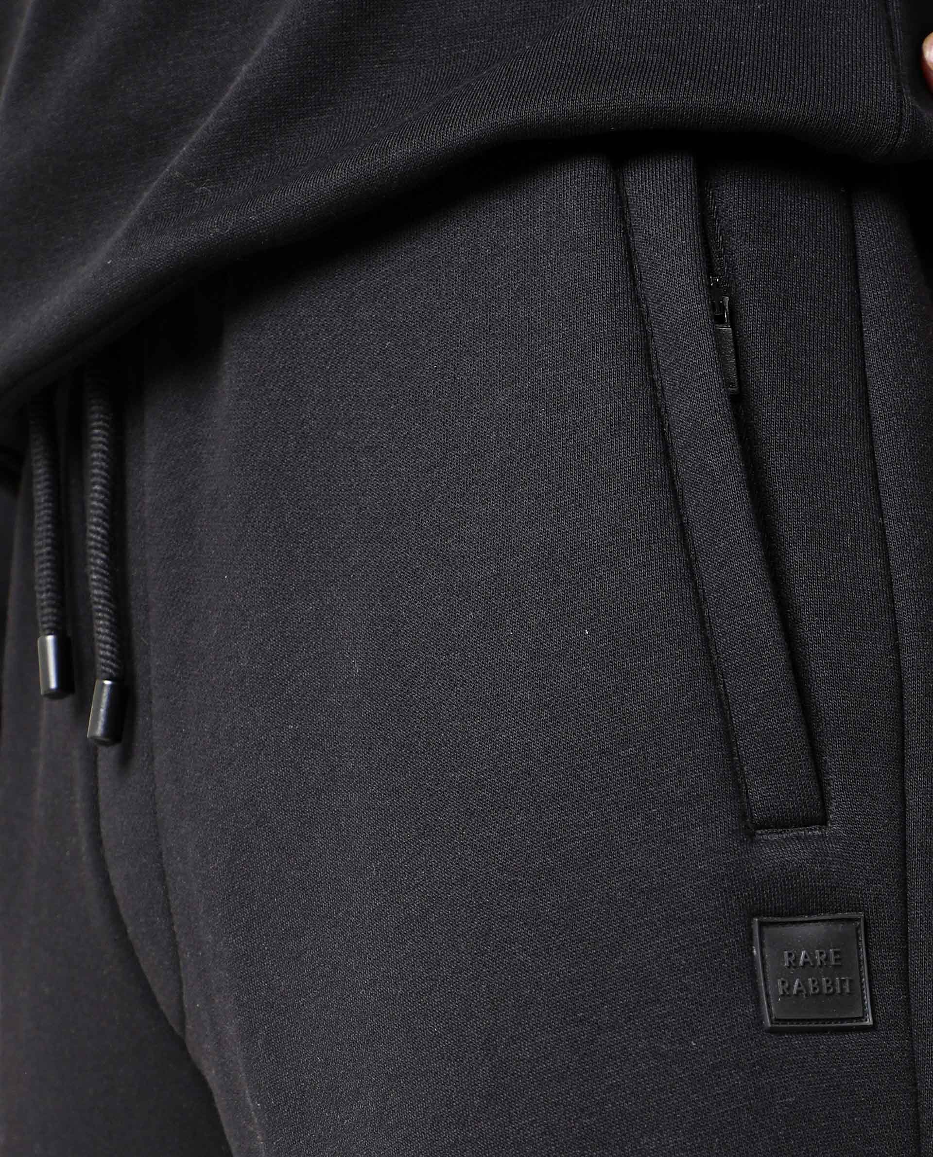 Rare Rabbit Men's Chase Black Cotton Plain Regular Fit Track Pant - Image 4