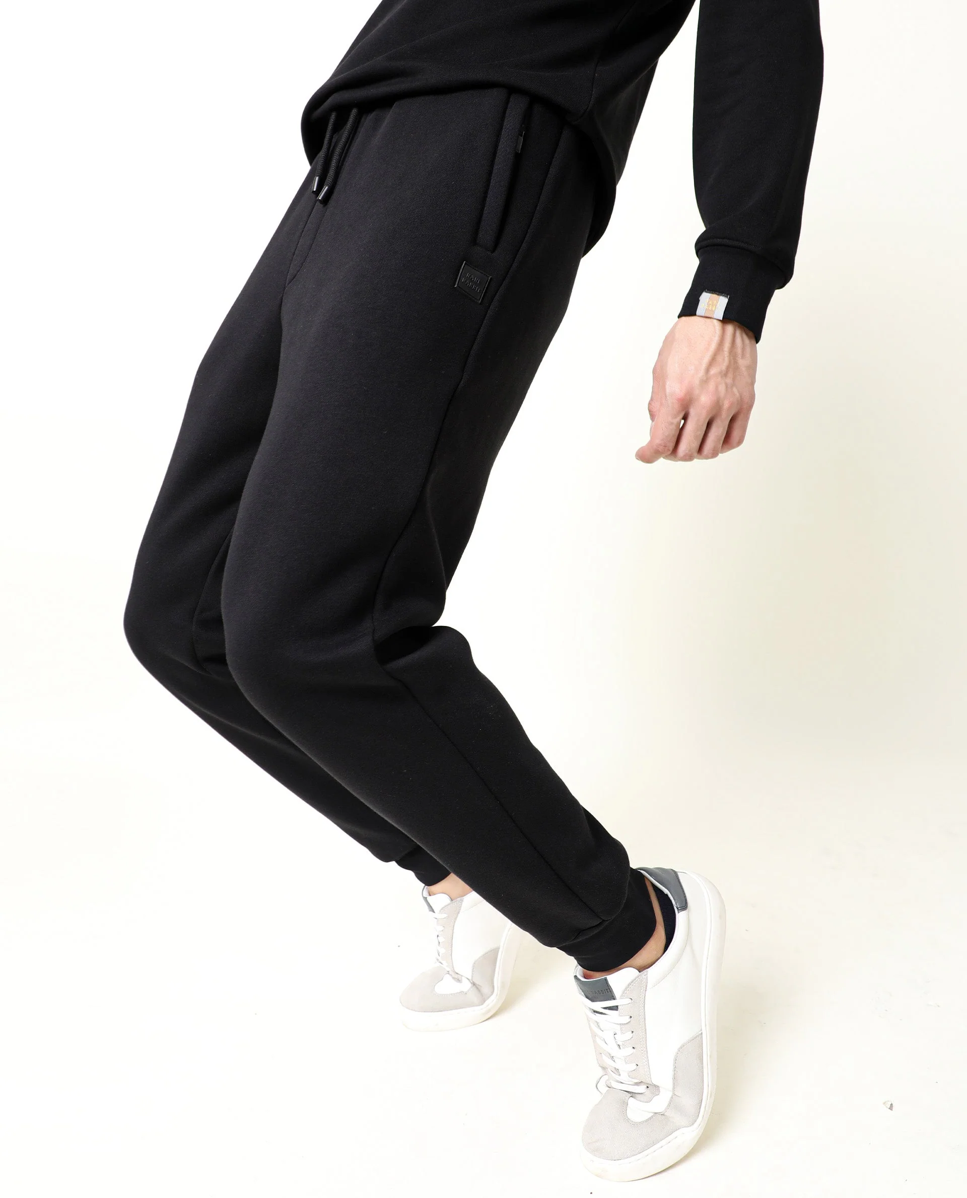 Rare Rabbit Men's Chase Black Cotton Plain Regular Fit Track Pant - Image 5