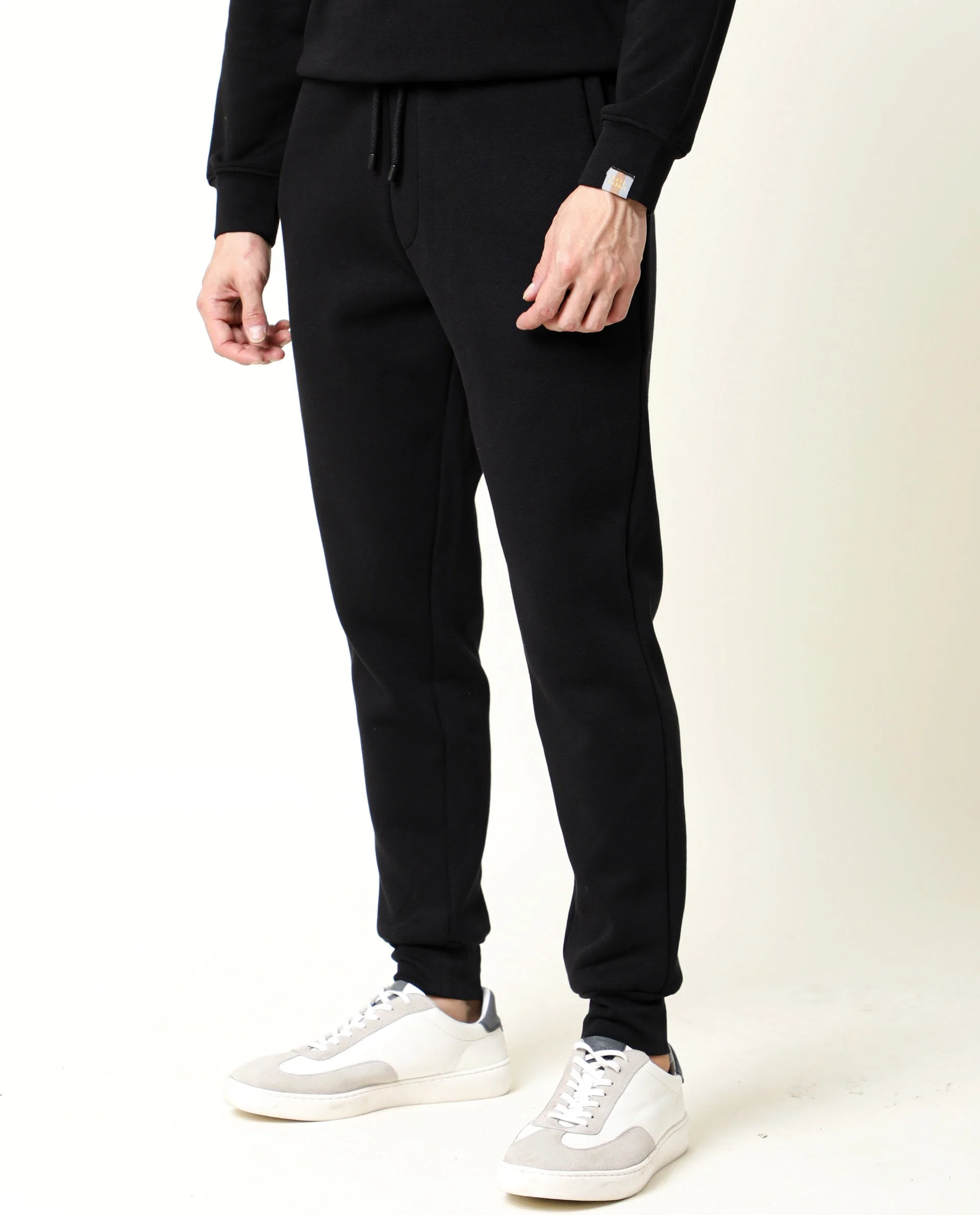 Rare Rabbit Men's Chase Black Cotton Plain Regular Fit Track Pant - Image 6