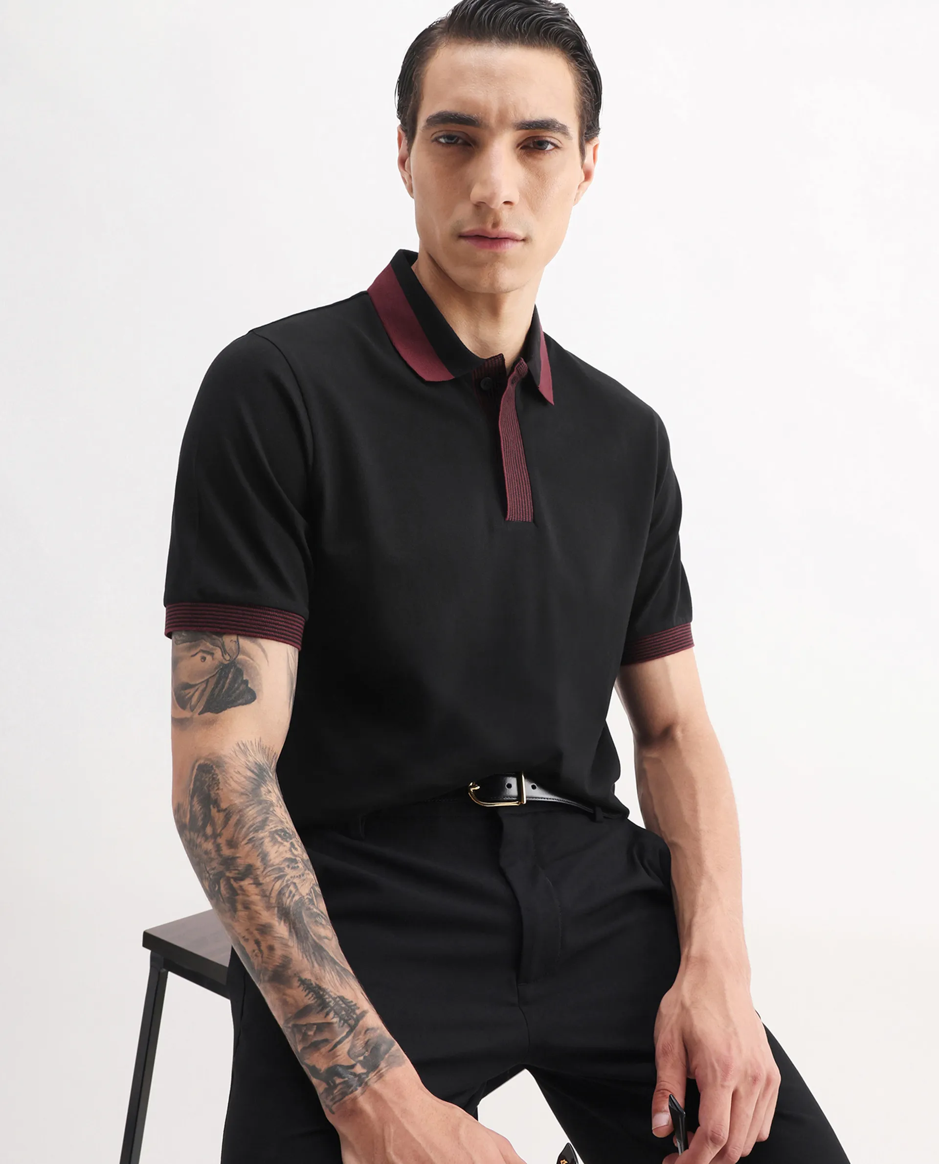 Rare Rabbit Men's Dane Black Cotton Blend Plain Regular Fit Half Sleeve Polo
