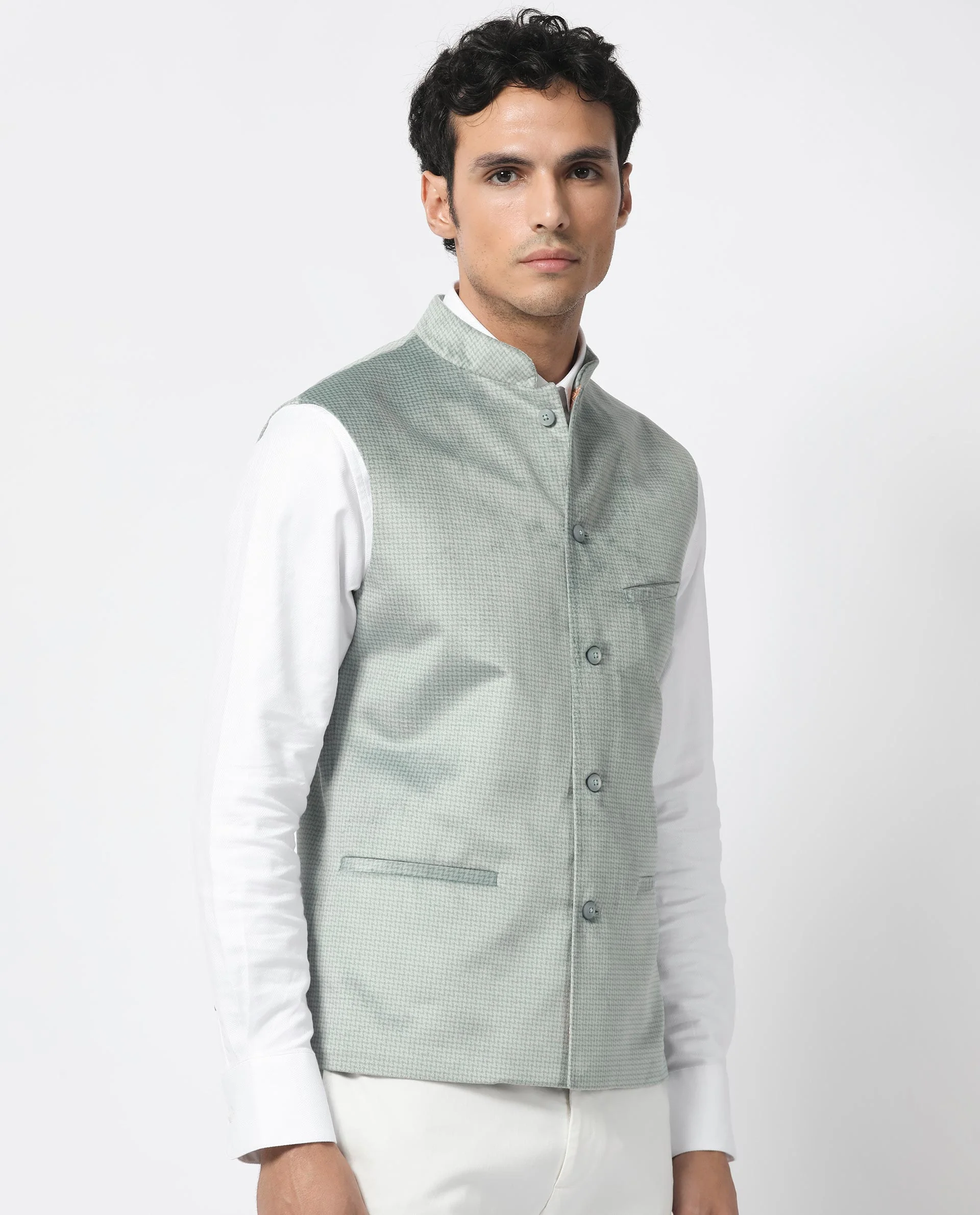 Rare Rabbit Men's Emerald Light Blue Polyester Plain Tailored Fit Sleeveless Mandarin Collar Bandhgala Rare Rabbit Men's Lasmos-B1 Beige Viscose Embroidered Regular Fit Sleeveless Mandarin Collar Bandhgala Nehru Jacket - Image 9