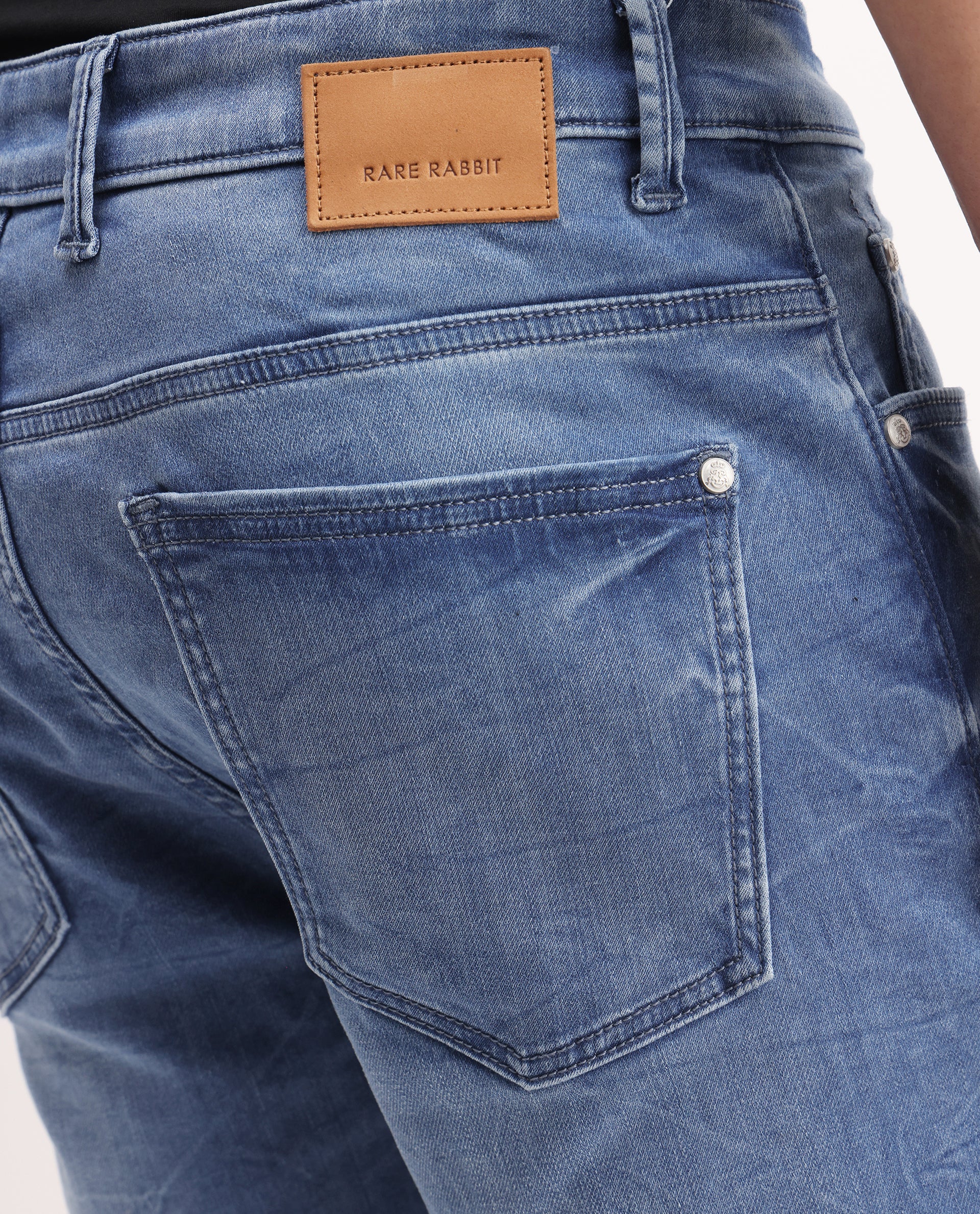 Rare Rabbit Men's Felix-K Blue Cotton Blend Plain Kurt Carrot Fit Jeans - Image 4
