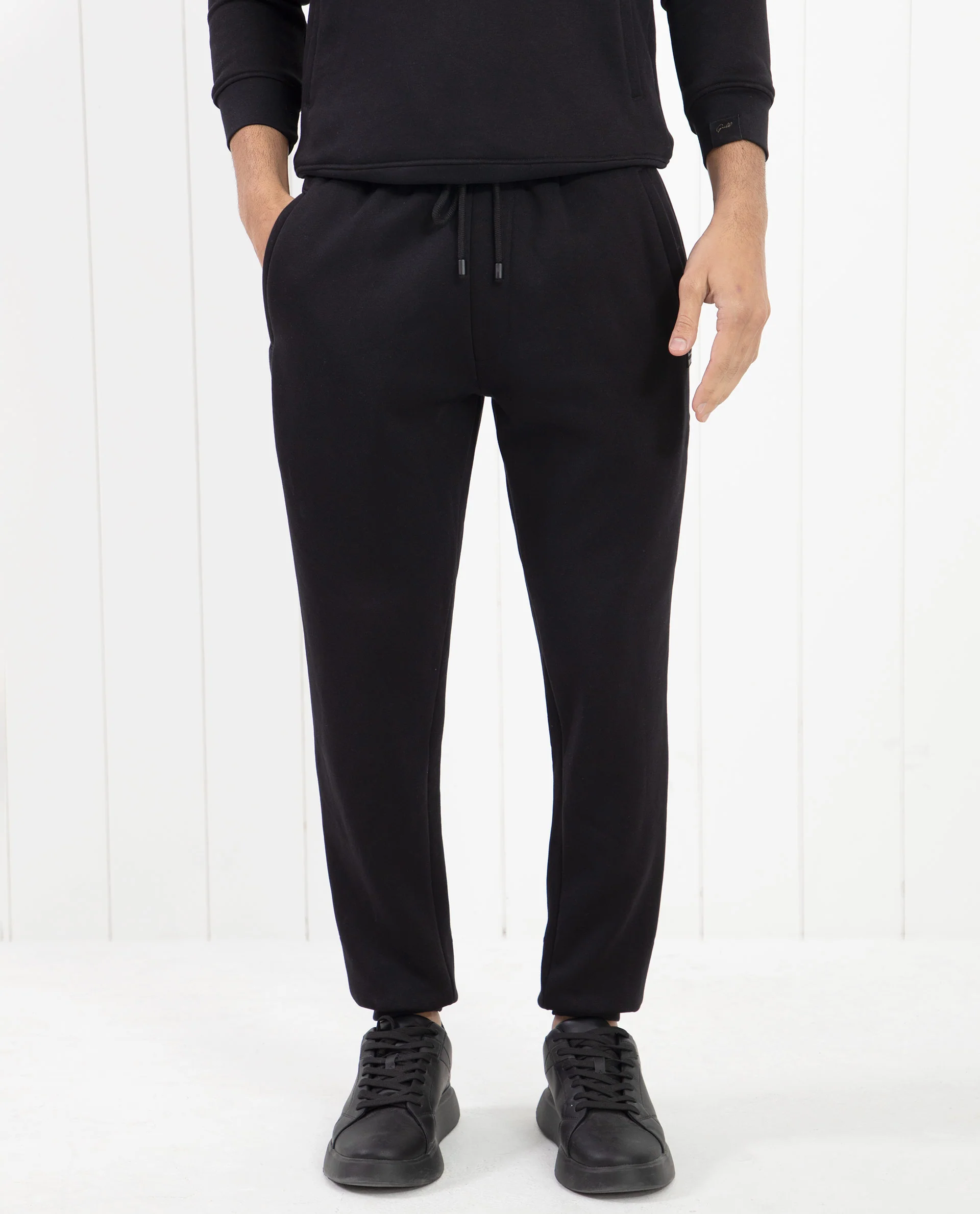 Rare Rabbit Men's Fulham Black Cotton Plain Regular Fit Track Pant