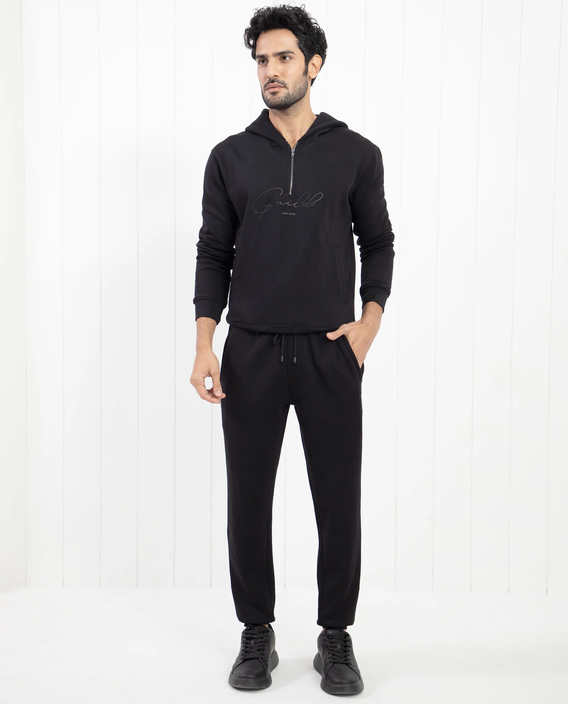 Rare Rabbit Men's Fulham Black Cotton Plain Regular Fit Track Pant - Image 2