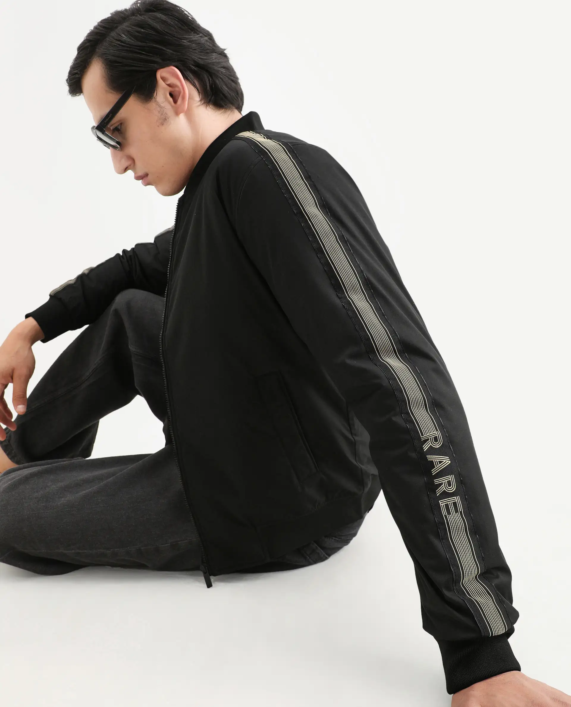 Rare Rabbit Men's Ghana Black Polyester Plain Regular Fit Full Sleeve Ribbed Collar Jacket