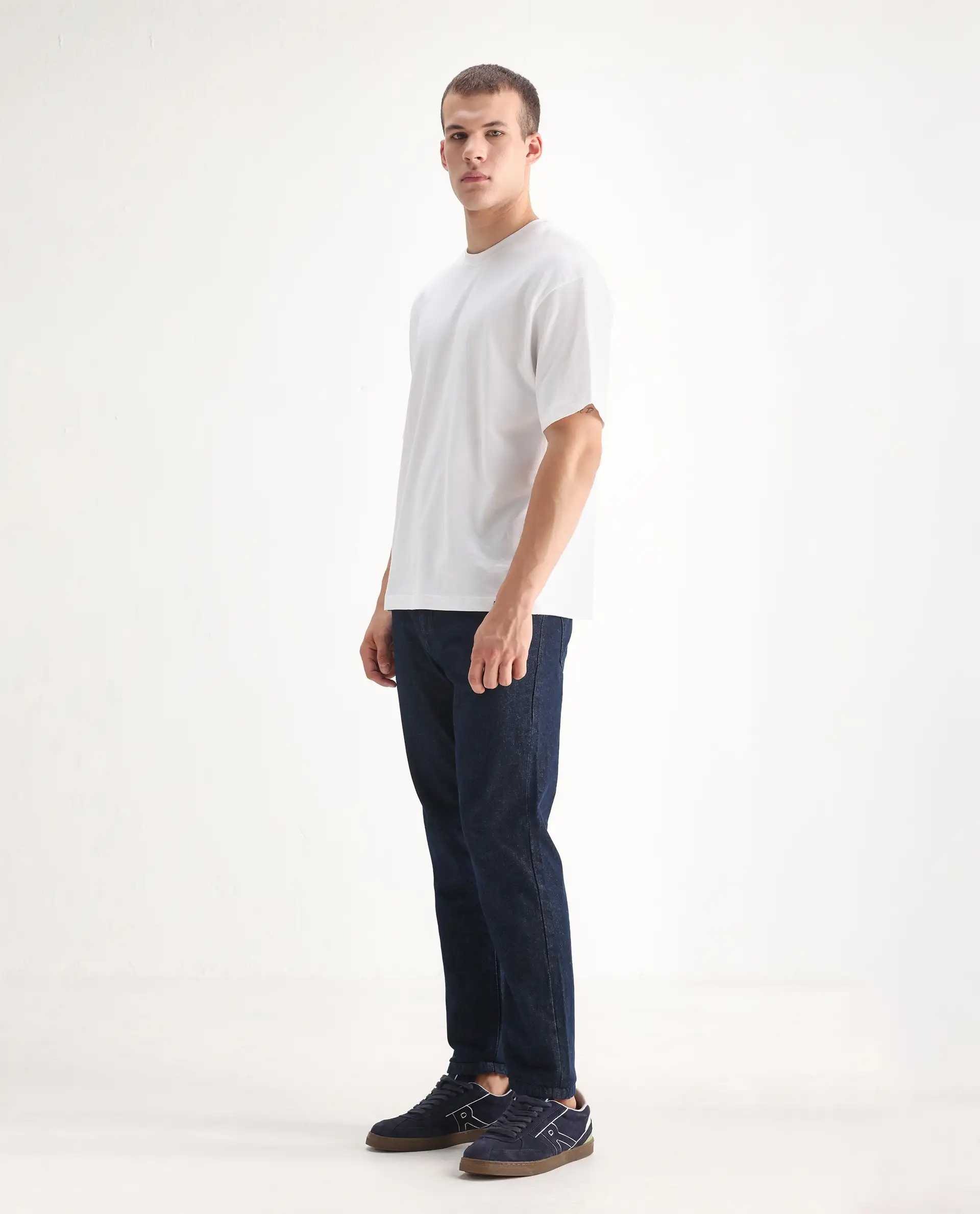 Rare Rabbit Men's Gleb Dark Blue Cotton Plain Kurt Carrot Fit Jeans - Image 4