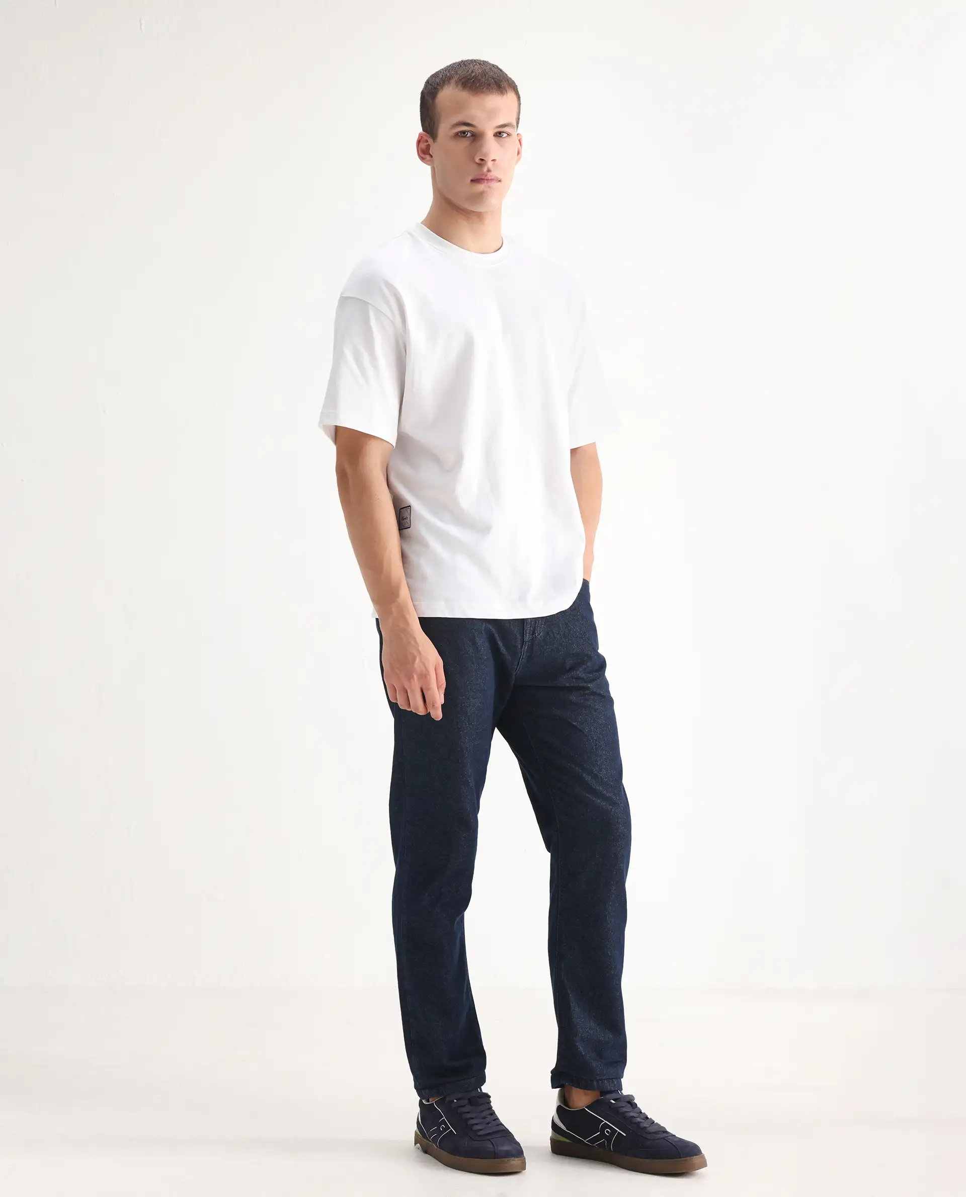 Rare Rabbit Men's Gleb Dark Blue Cotton Plain Kurt Carrot Fit Jeans - Image 5
