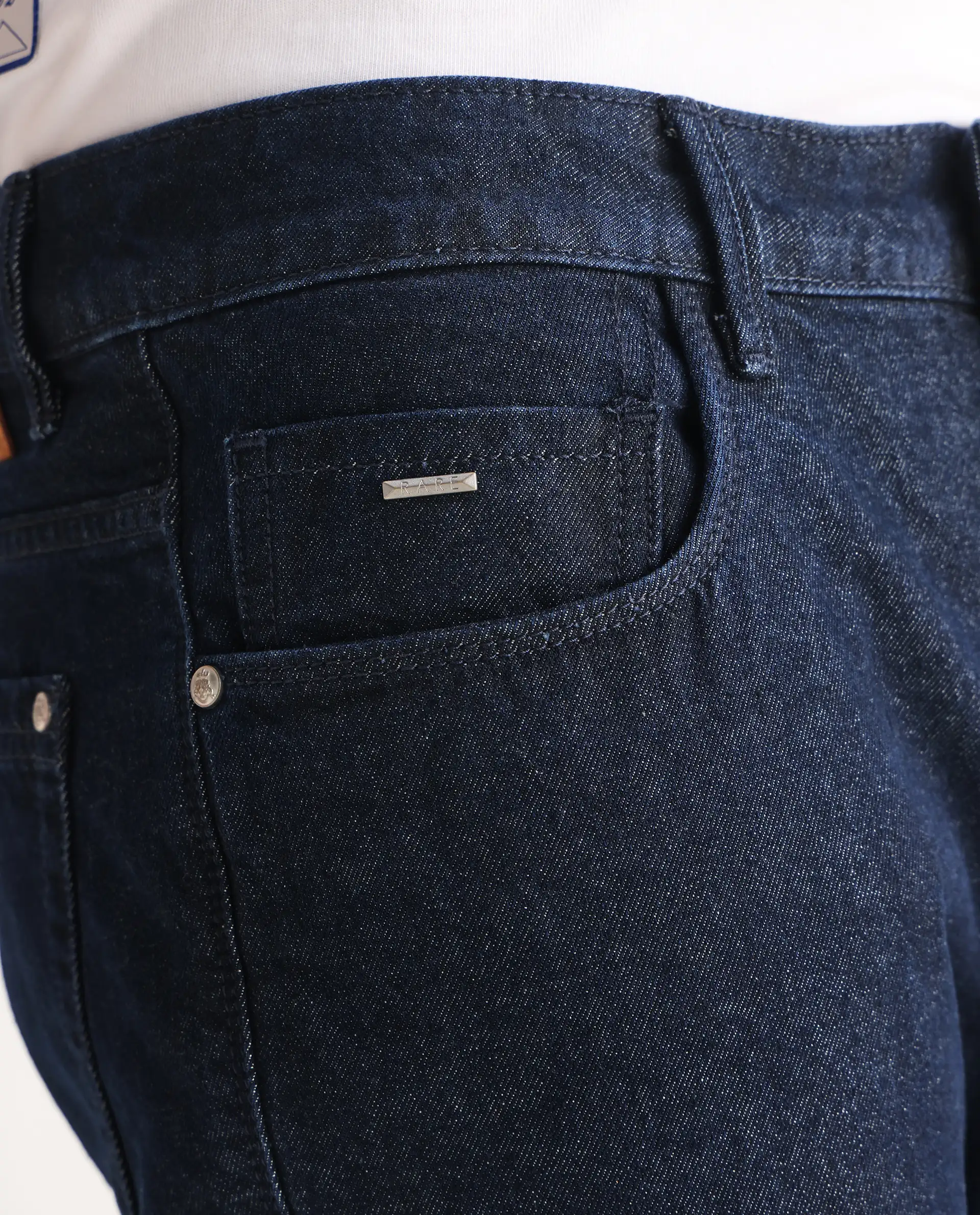 Rare Rabbit Men's Gleb Dark Blue Cotton Plain Kurt Carrot Fit Jeans - Image 8