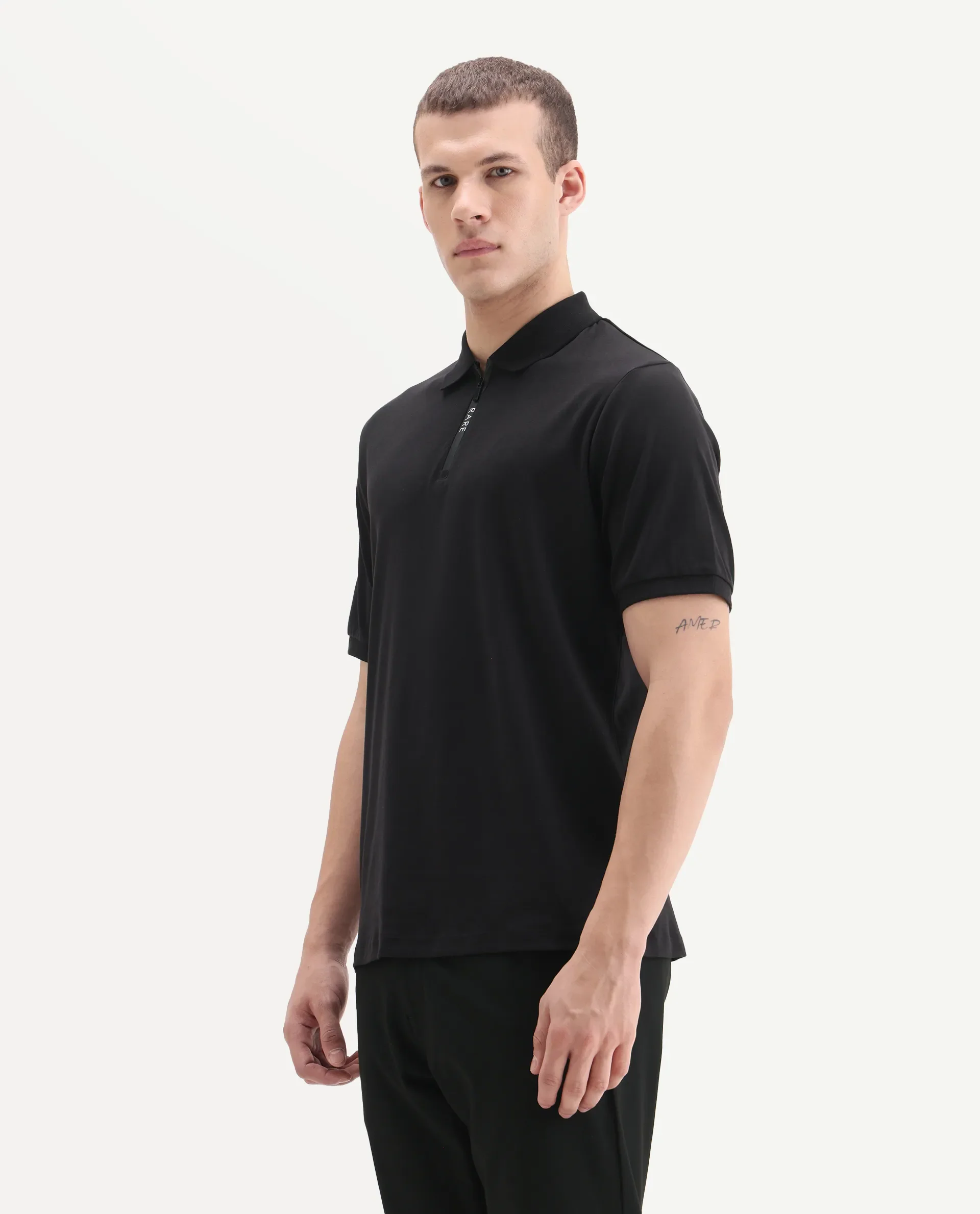 Rare Rabbit Men's Holit-1 Black Cotton Plain Regular Fit Half Sleeve Polo - Image 4