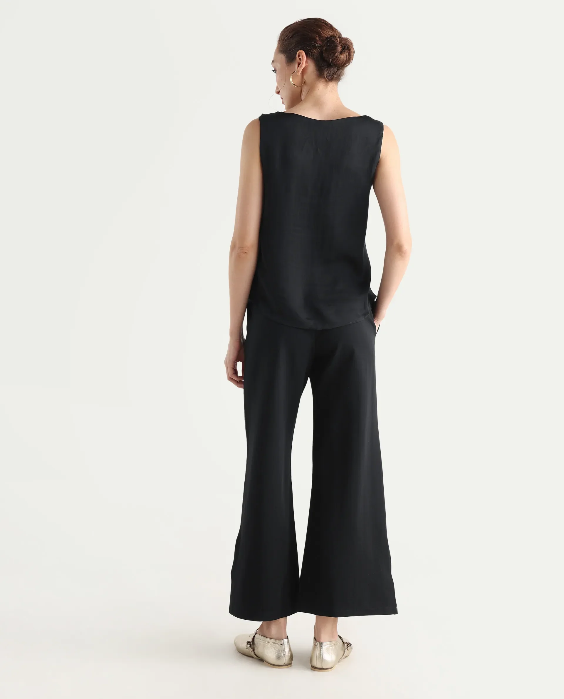 Rareism Women's Jancuri Black Rayon Blend Plain Ankle Length Straight Fit Travel Trouser - Image 9