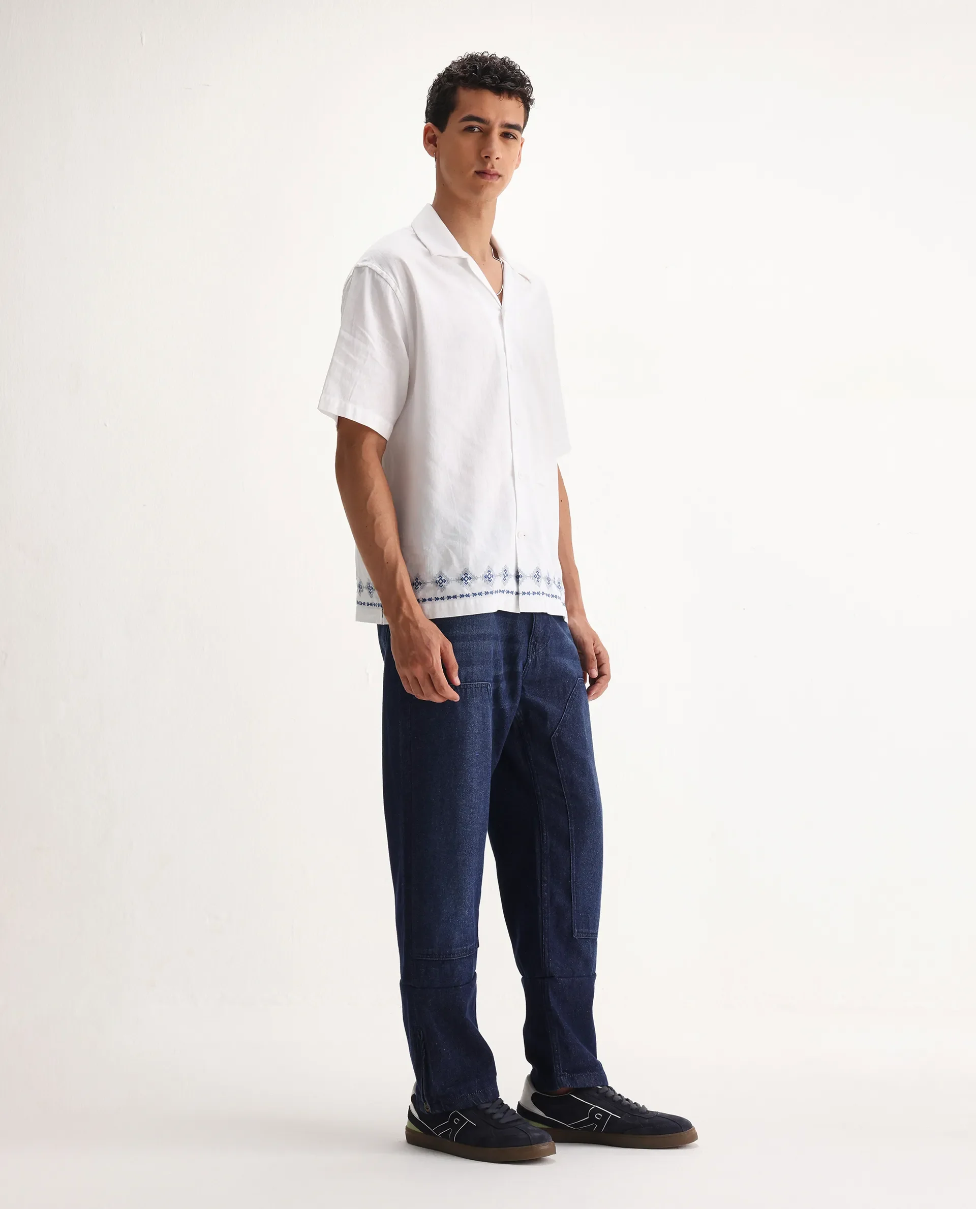 Rare Rabbit Men's Jettor Dark Blue Cotton Plain Relaxed Fit Jeans - Image 5