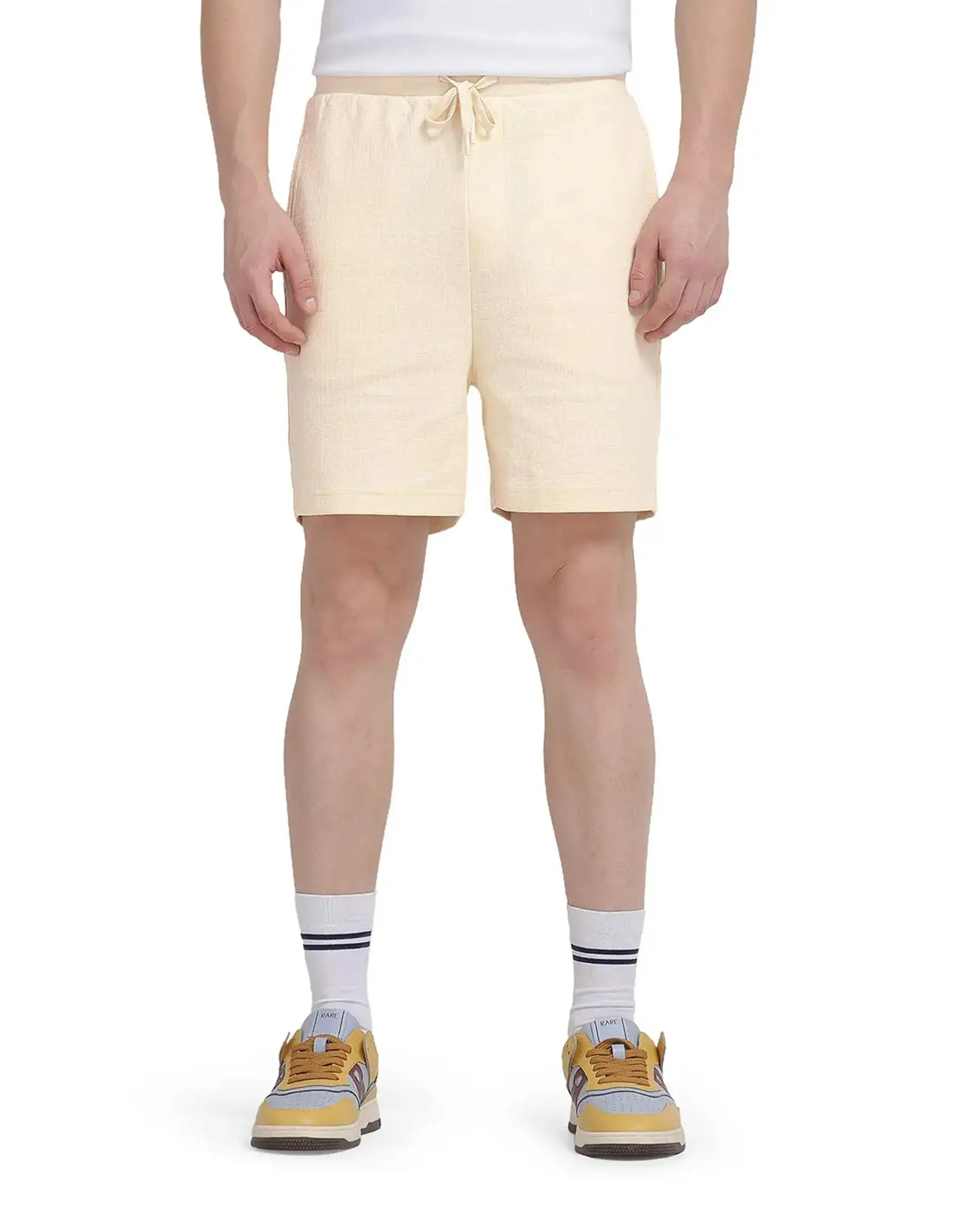 Rare Rabbit Men's Kelor Pastel Yellow Cotton Blend Plain Regular Fit Shorts - Image 11