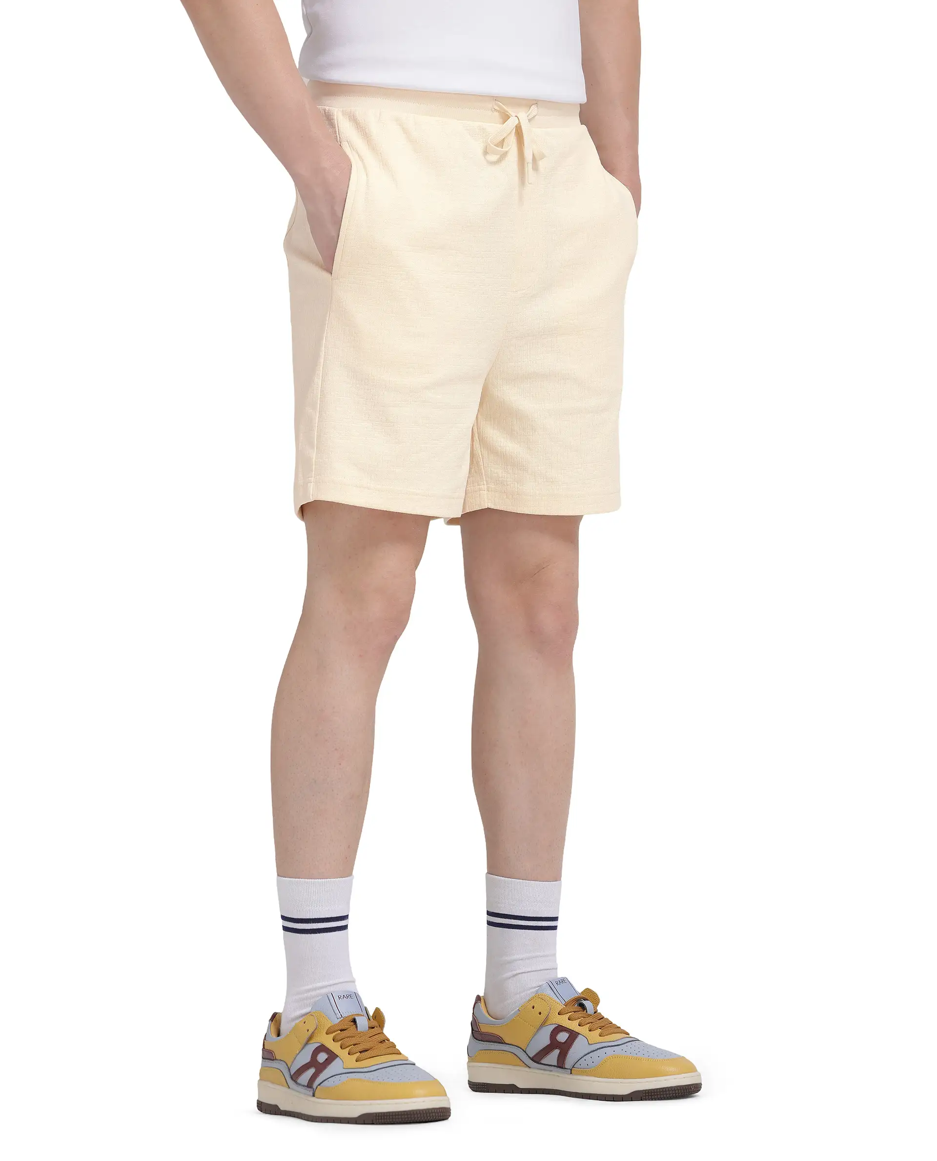 Rare Rabbit Men's Kelor Pastel Yellow Cotton Blend Plain Regular Fit Shorts - Image 9