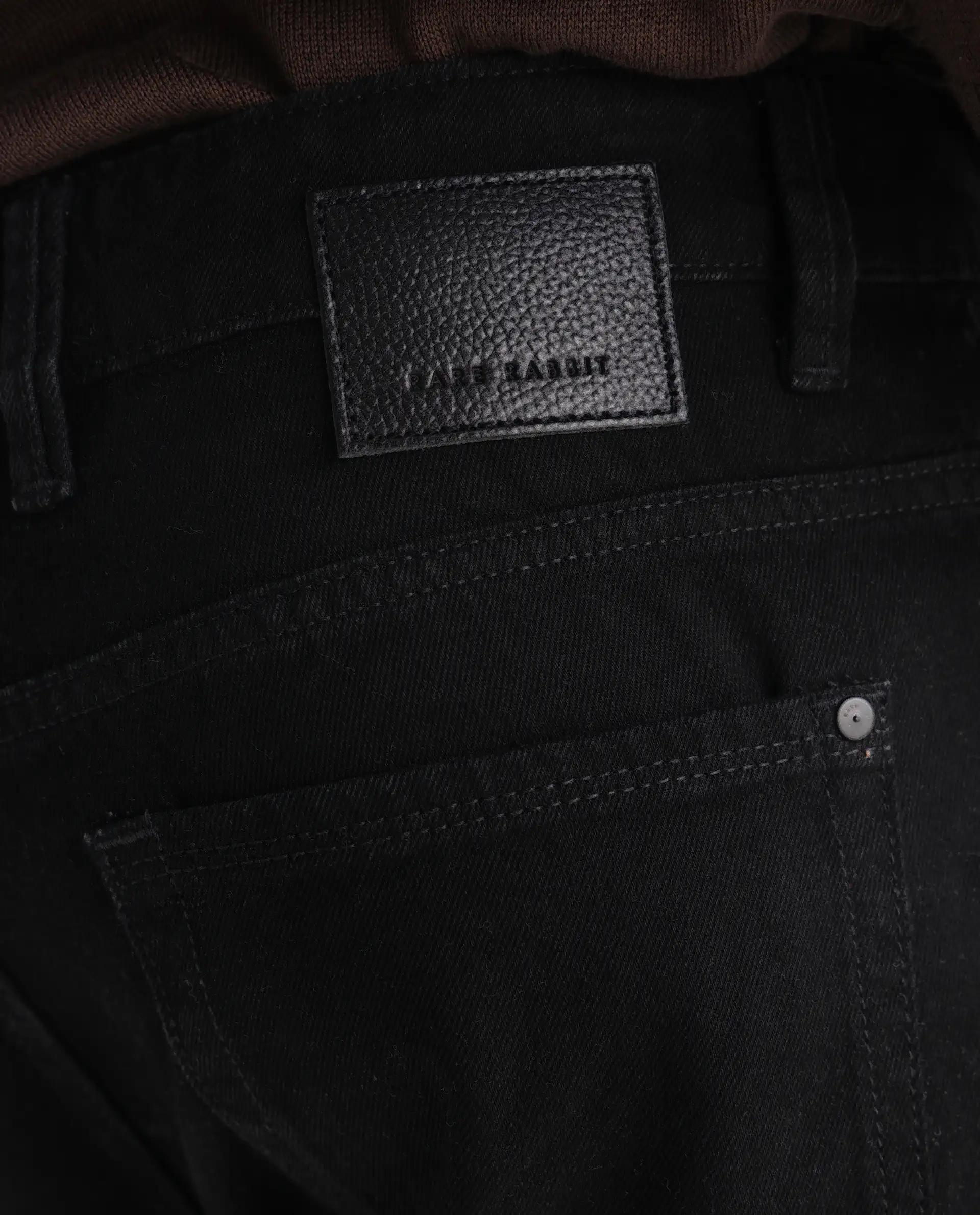 Rare Rabbit Men's Khal Black Cotton Plain Kurt Carrot Fit Jeans - Image 8