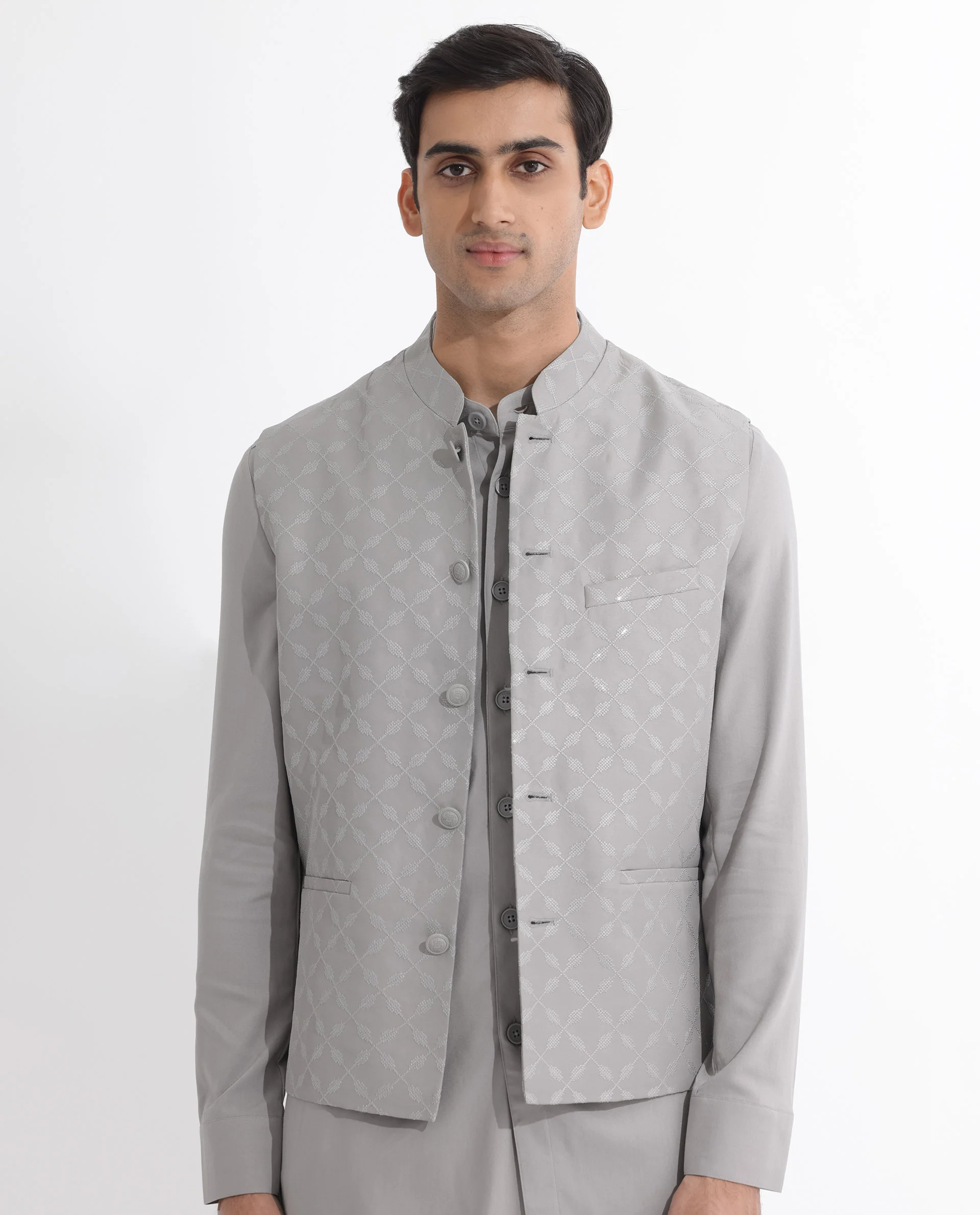Rare Rabbit Men's Medob Grey Viscose Embroidered Tailored Fit Sleeveless Mandarin Collar Bandhgala Rare Rabbit Men's Lasmos-B1 Beige Viscose Embroidered Regular Fit Sleeveless Mandarin Collar Bandhgala Nehru Jacket