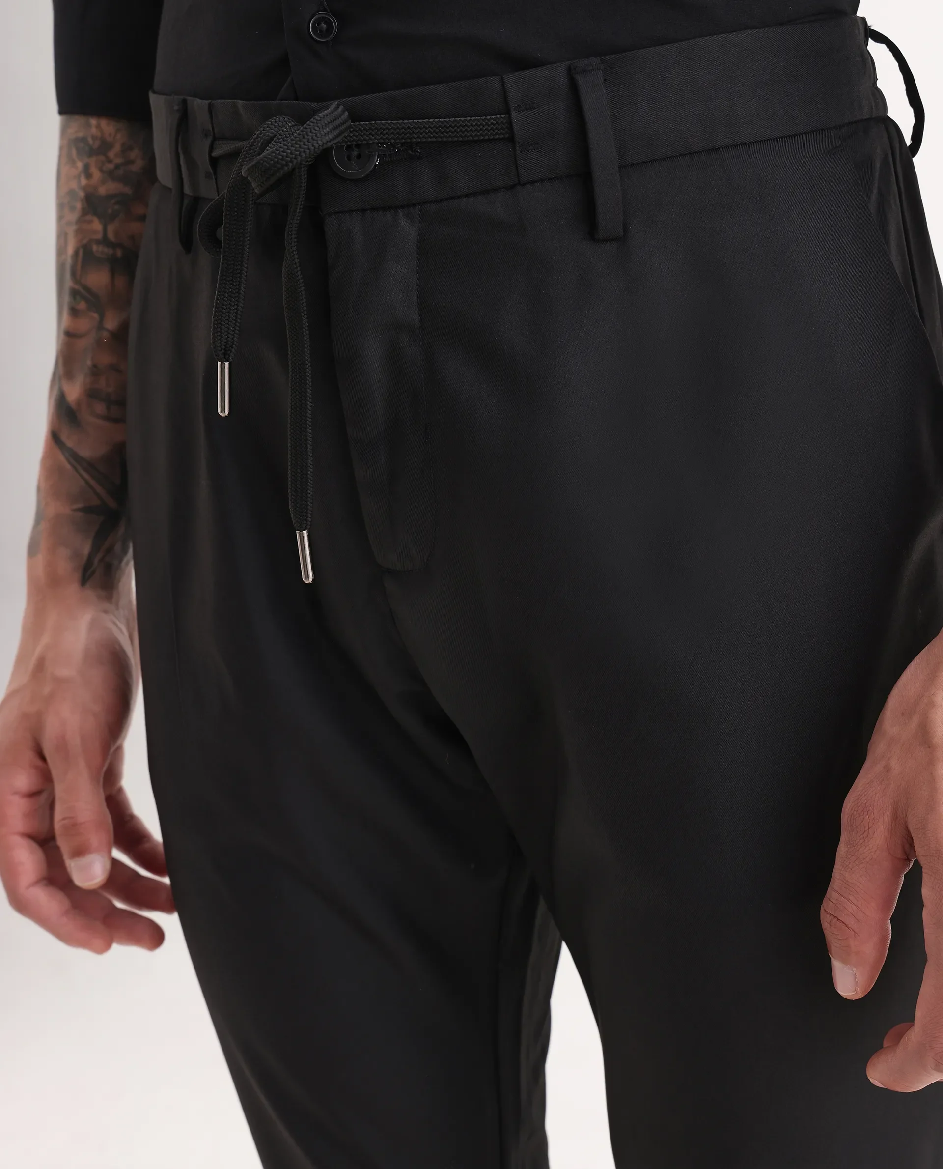 Rare Rabbit Men's Nimb Black Polyester Fabric Drawstring And Button Closure High Rise Regular Fit Solid Trousers - Image 3