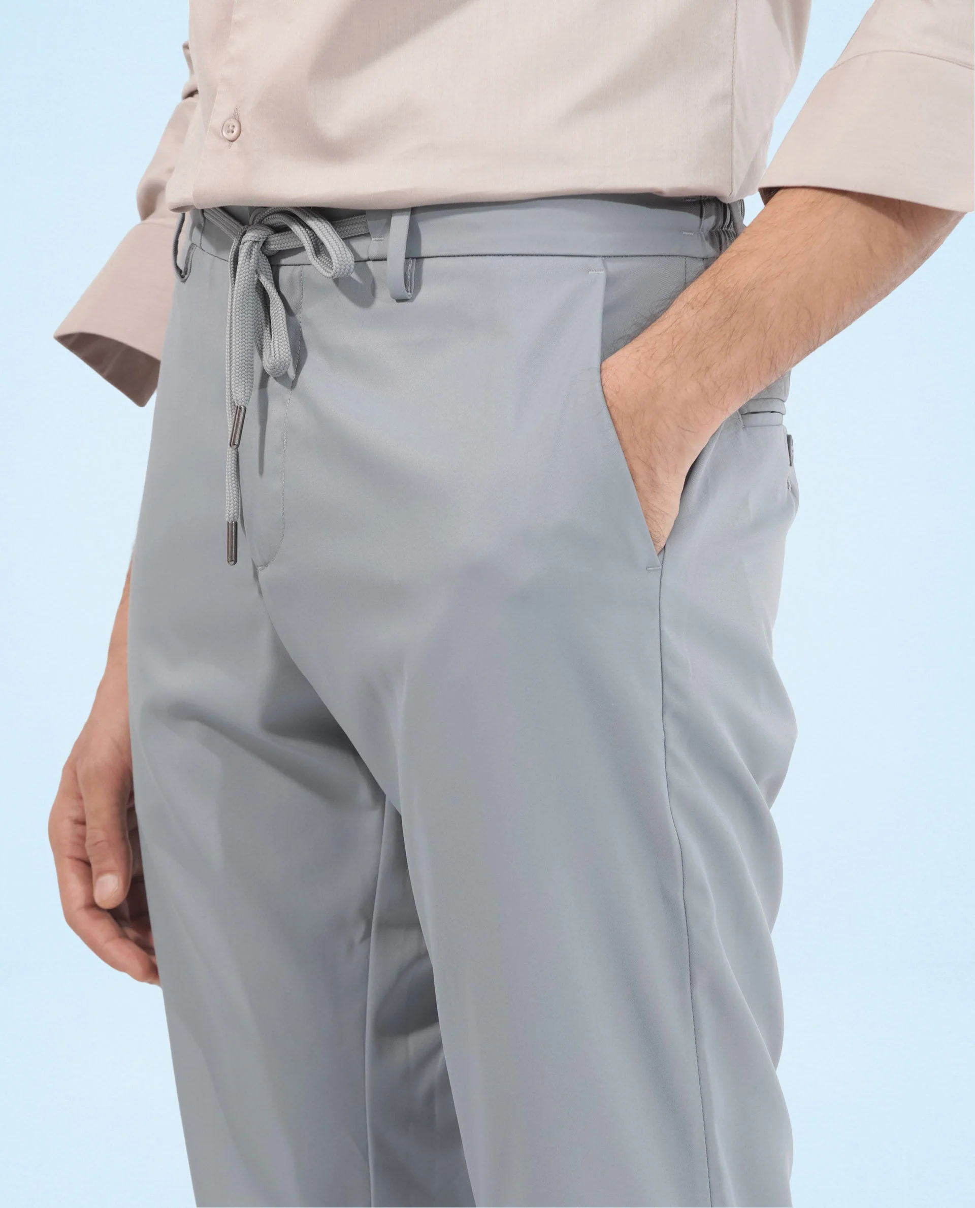 Rare Rabbit Men's Nimb Dusky Blue Polyester Fabric Drawstring And Button Closure High Rise Regular Fit Solid Trousers - Image 2