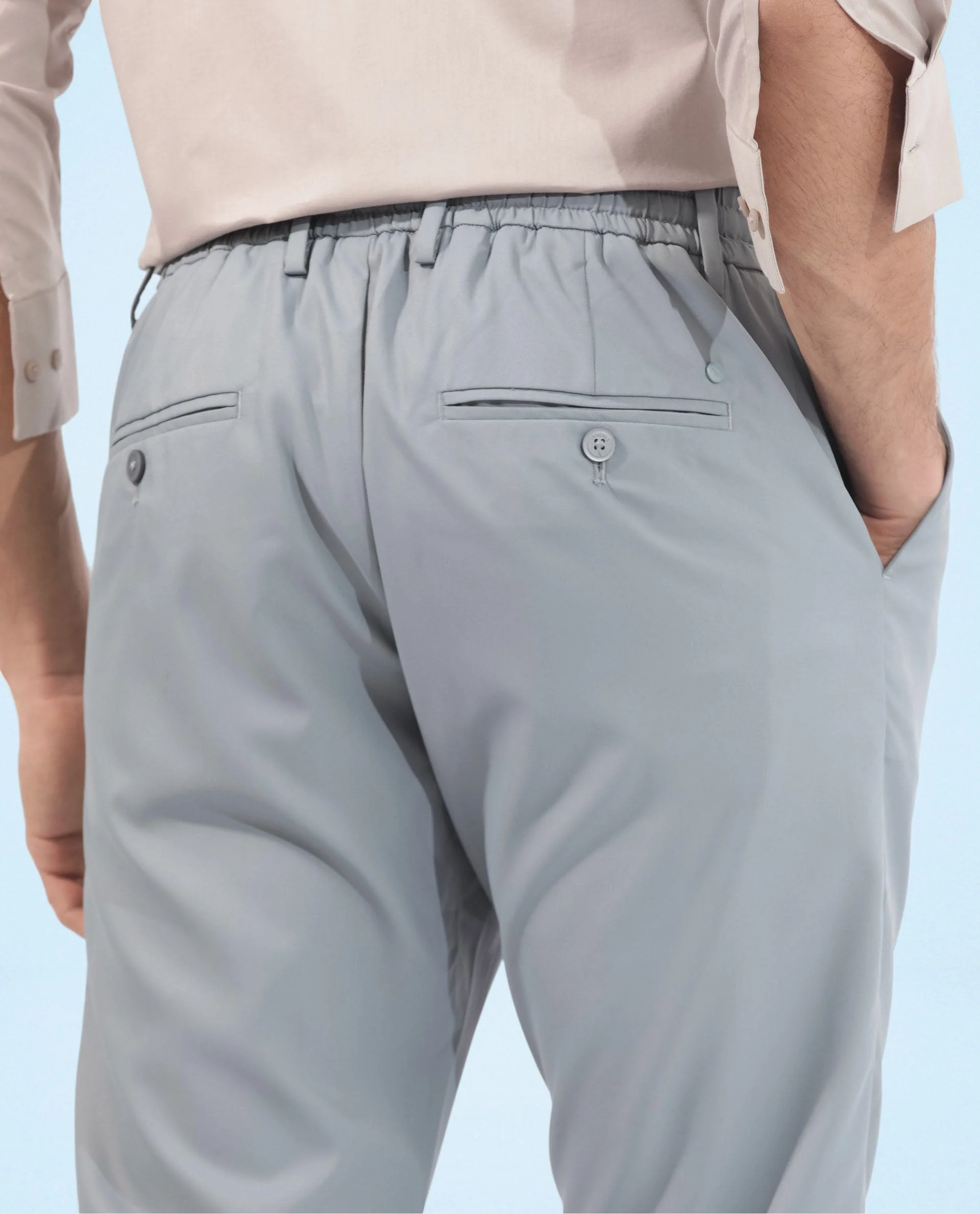 Rare Rabbit Men's Nimb Dusky Blue Polyester Fabric Drawstring And Button Closure High Rise Regular Fit Solid Trousers - Image 8