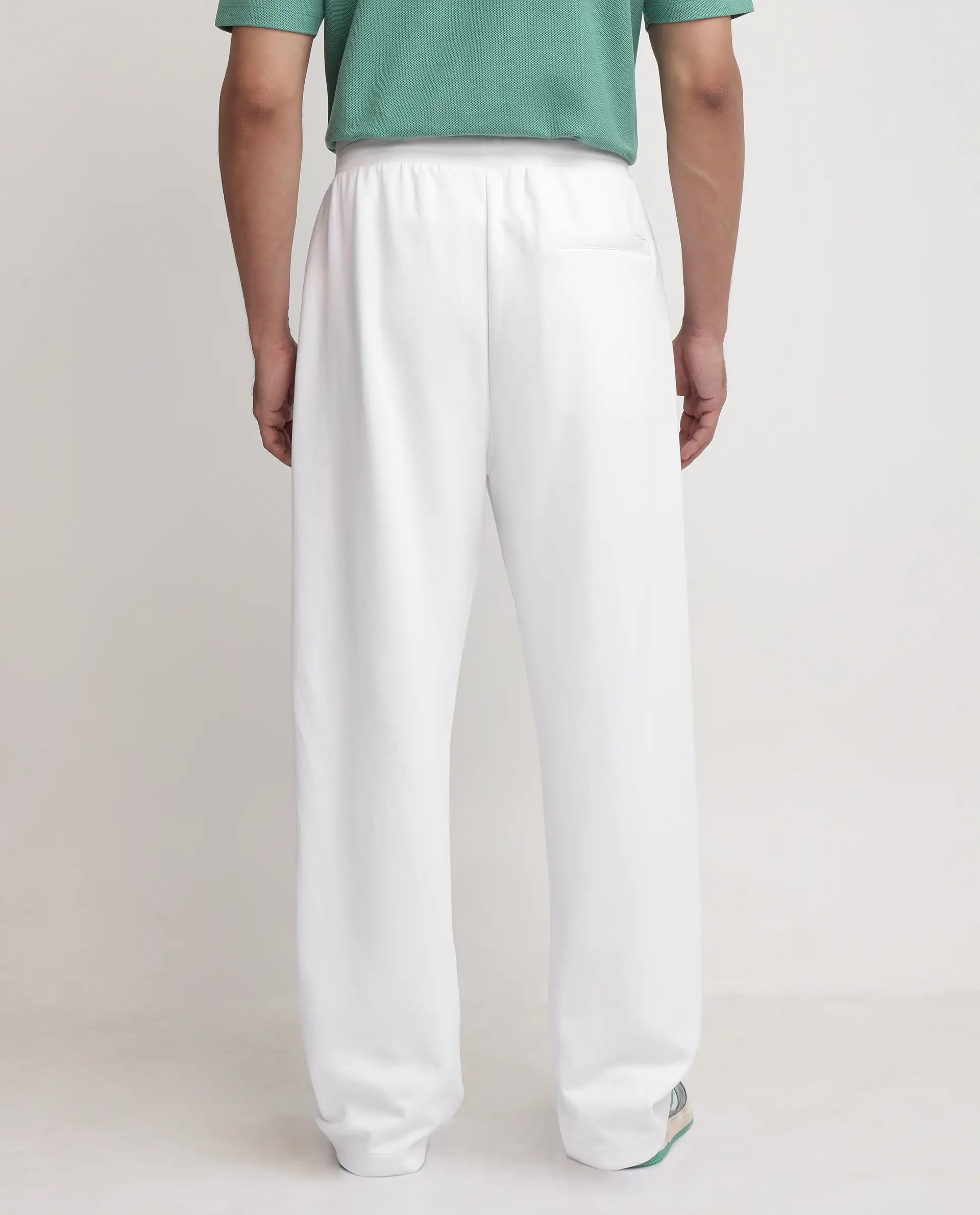 Rare Rabbit Men's Oblic White Cotton Blend Plain Relaxed Fit Track Pant - Image 4