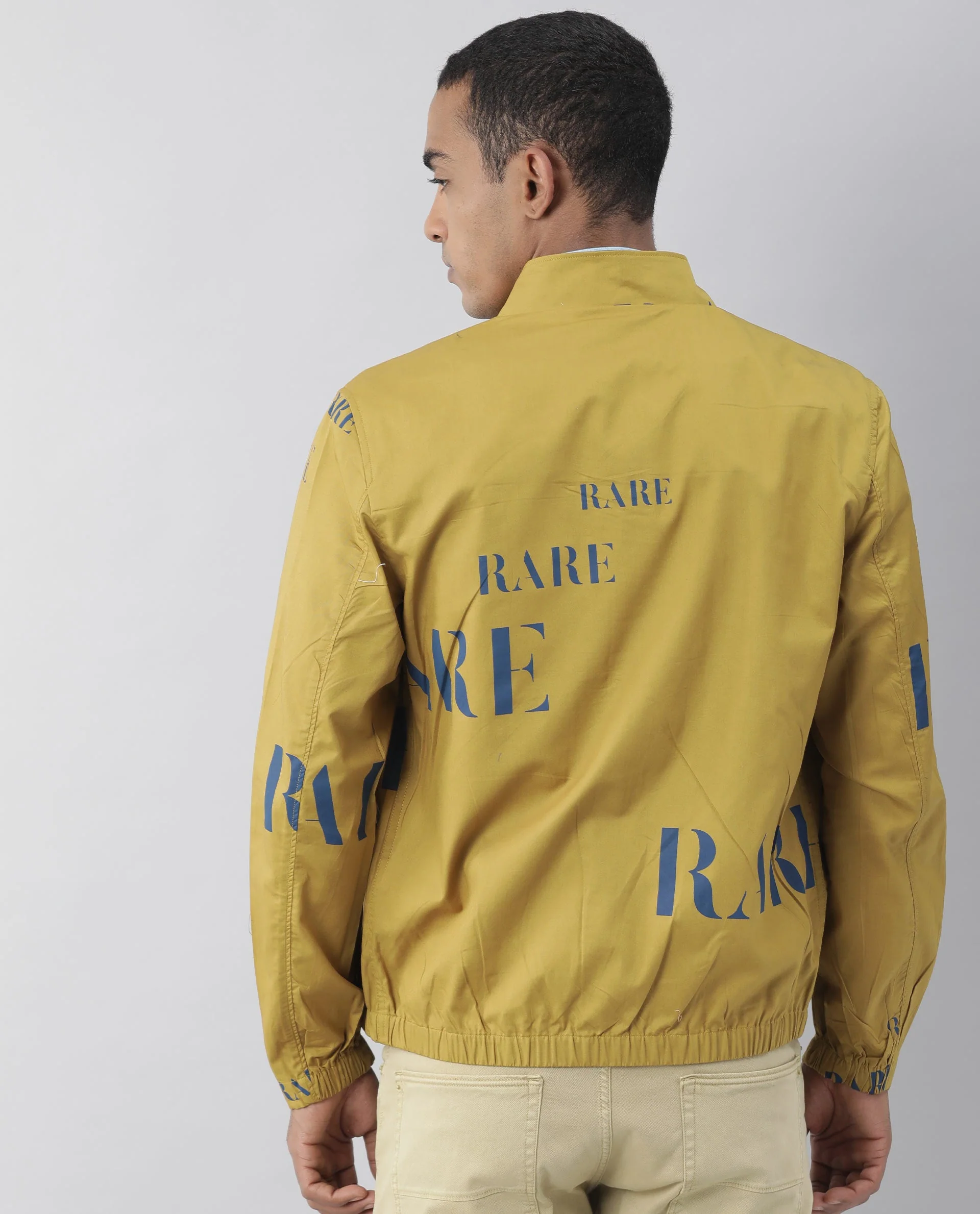 Rare Rabbit Men's Overed Mustard Polyester Monogram Print Regular Fit Full Sleeve High Neck Jacket - Image 2
