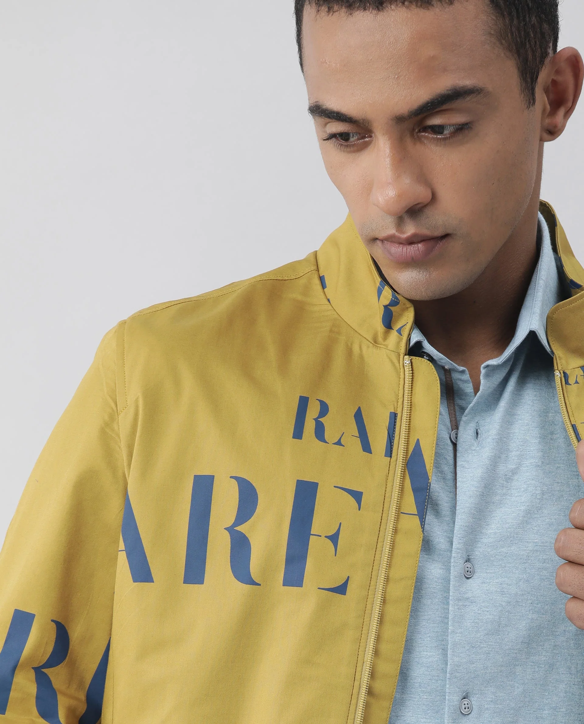 Rare Rabbit Men's Overed Mustard Polyester Monogram Print Regular Fit Full Sleeve High Neck Jacket - Image 3