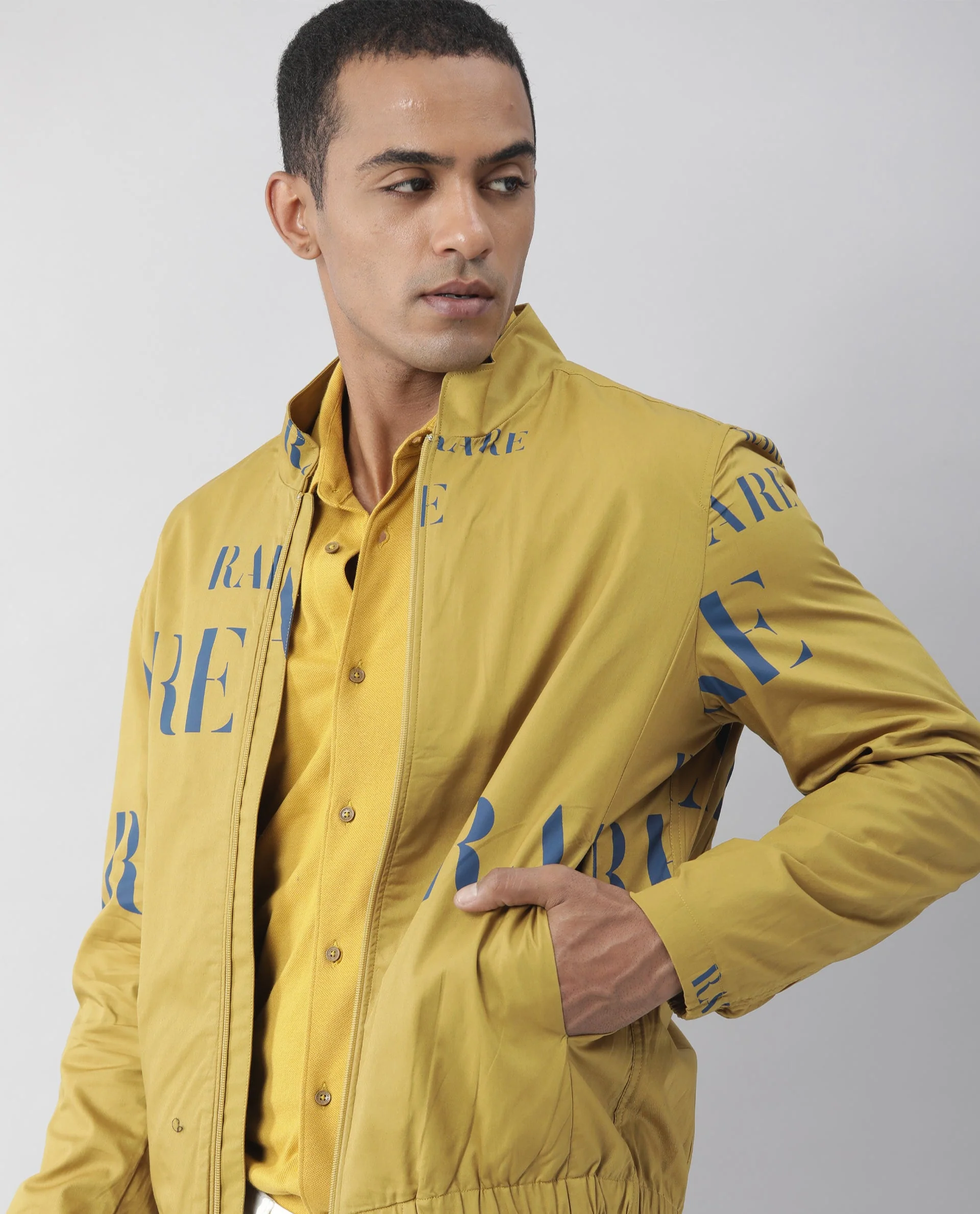 Rare Rabbit Men's Overed Mustard Polyester Monogram Print Regular Fit Full Sleeve High Neck Jacket - Image 6