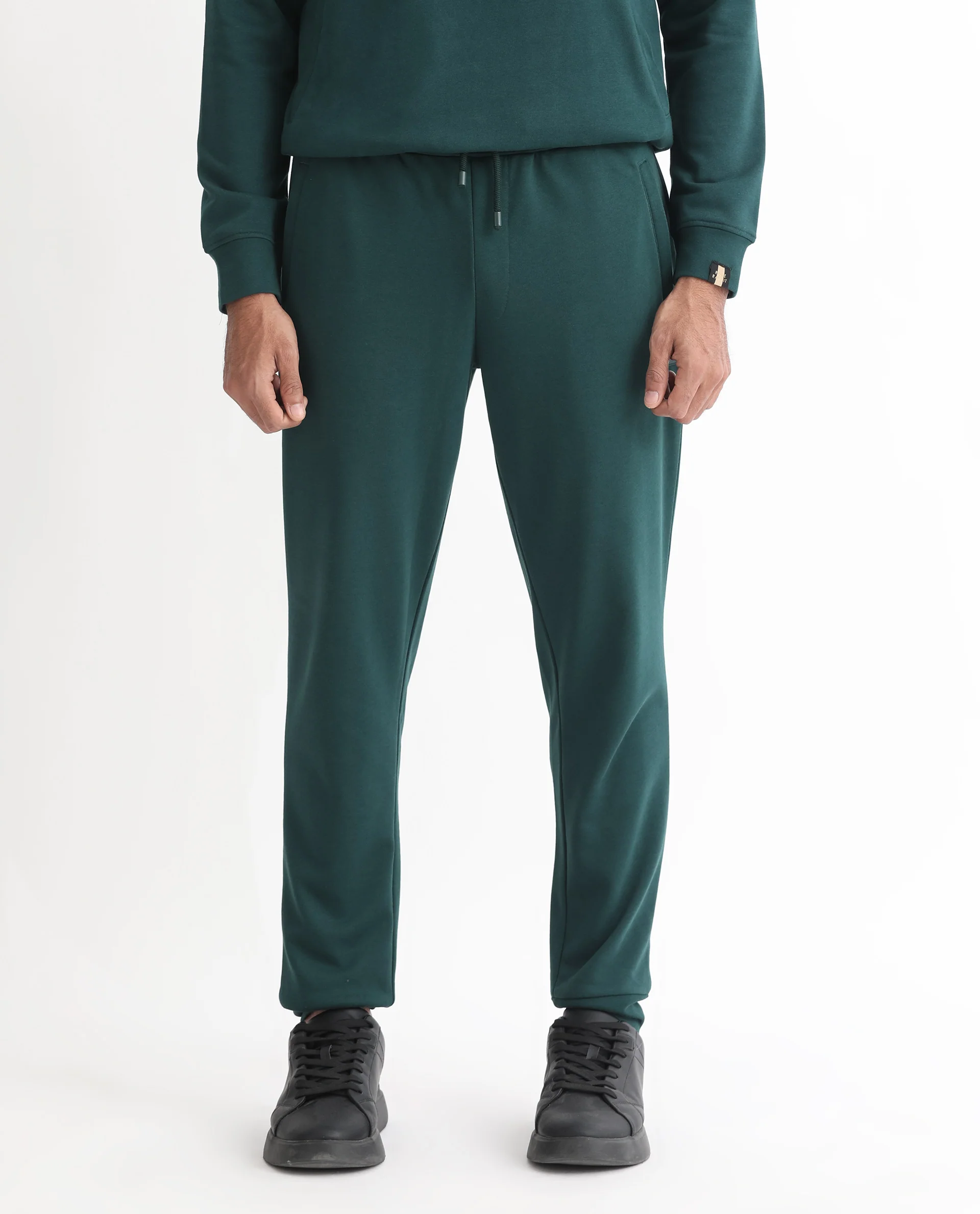 Rare Rabbit Men's Oza Dark Green Cotton Plain Regular Fit Jogers - Image 4