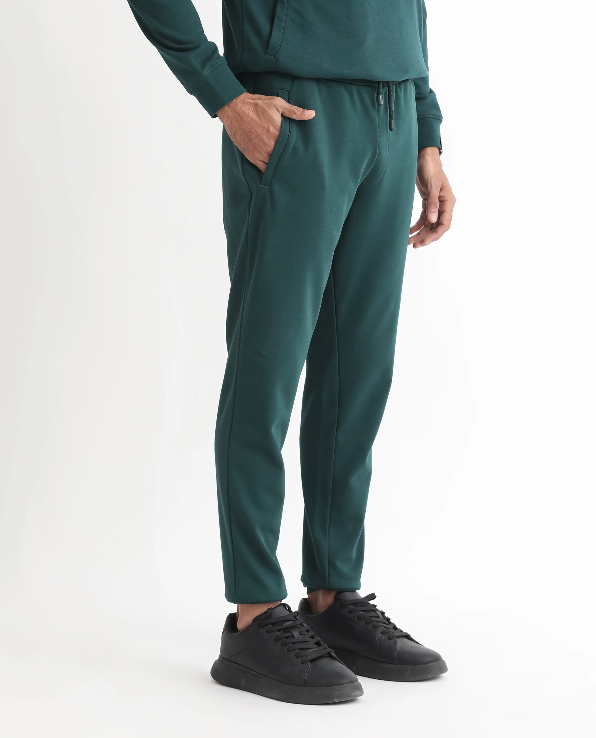 Rare Rabbit Men's Oza Dark Green Cotton Plain Regular Fit Jogers - Image 5