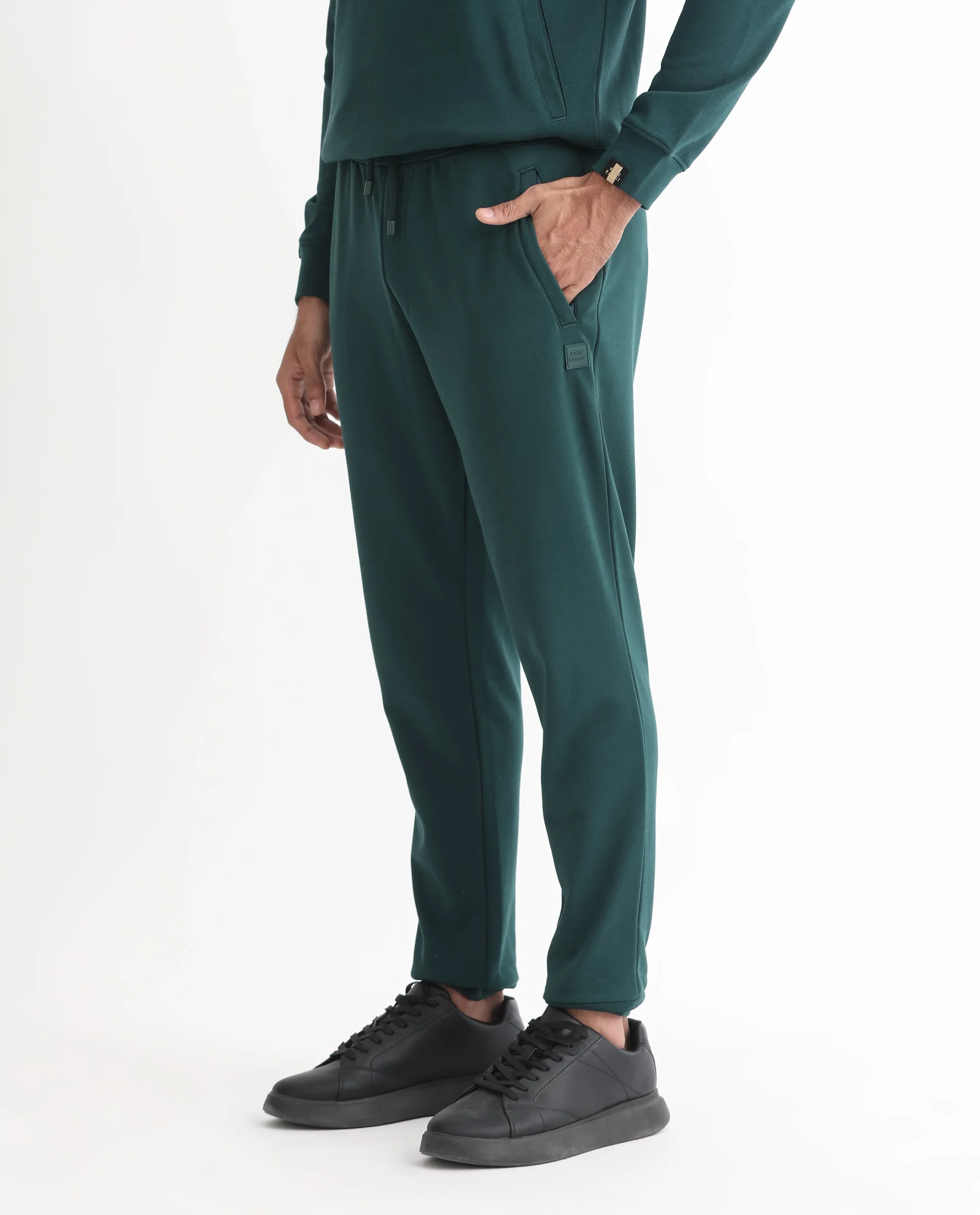 Rare Rabbit Men's Oza Dark Green Cotton Plain Regular Fit Jogers - Image 6