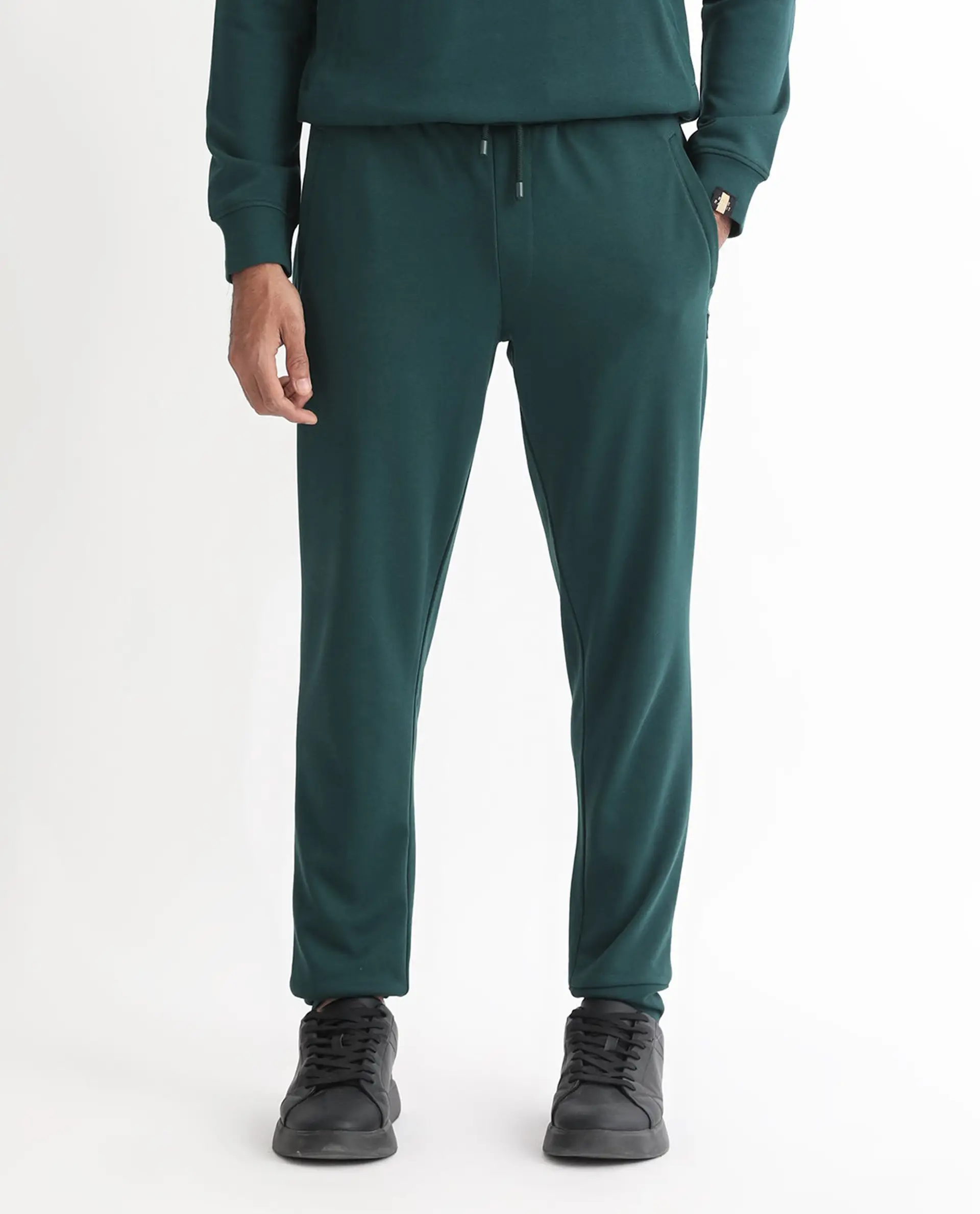 Rare Rabbit Men's Oza Dark Green Cotton Plain Regular Fit Jogers - Image 8